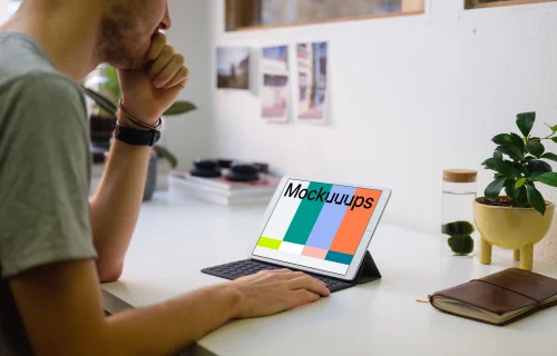 Young man working on the iPad Pro mockup
