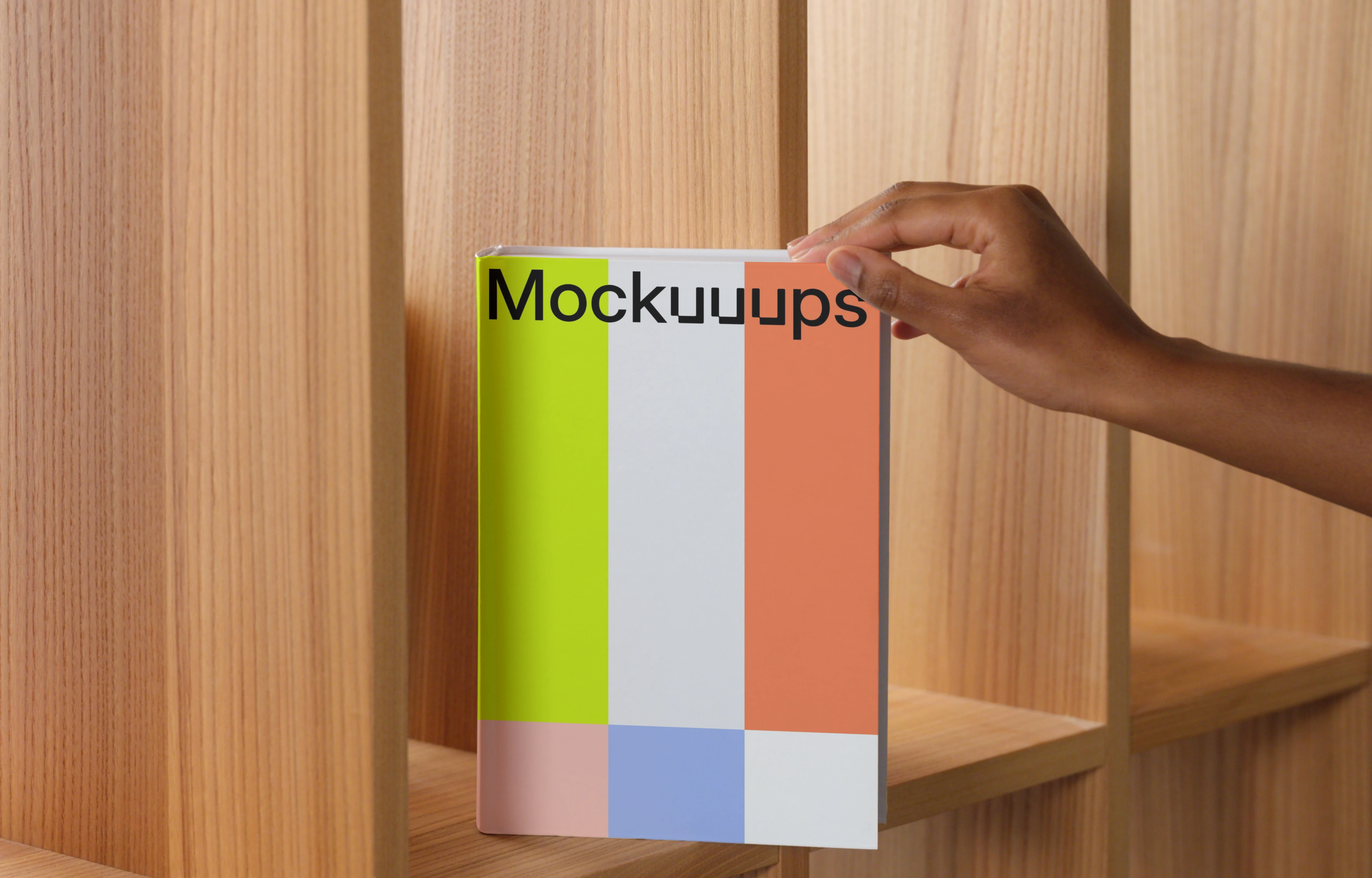 Book mockup on a wooden shelf with hand placement