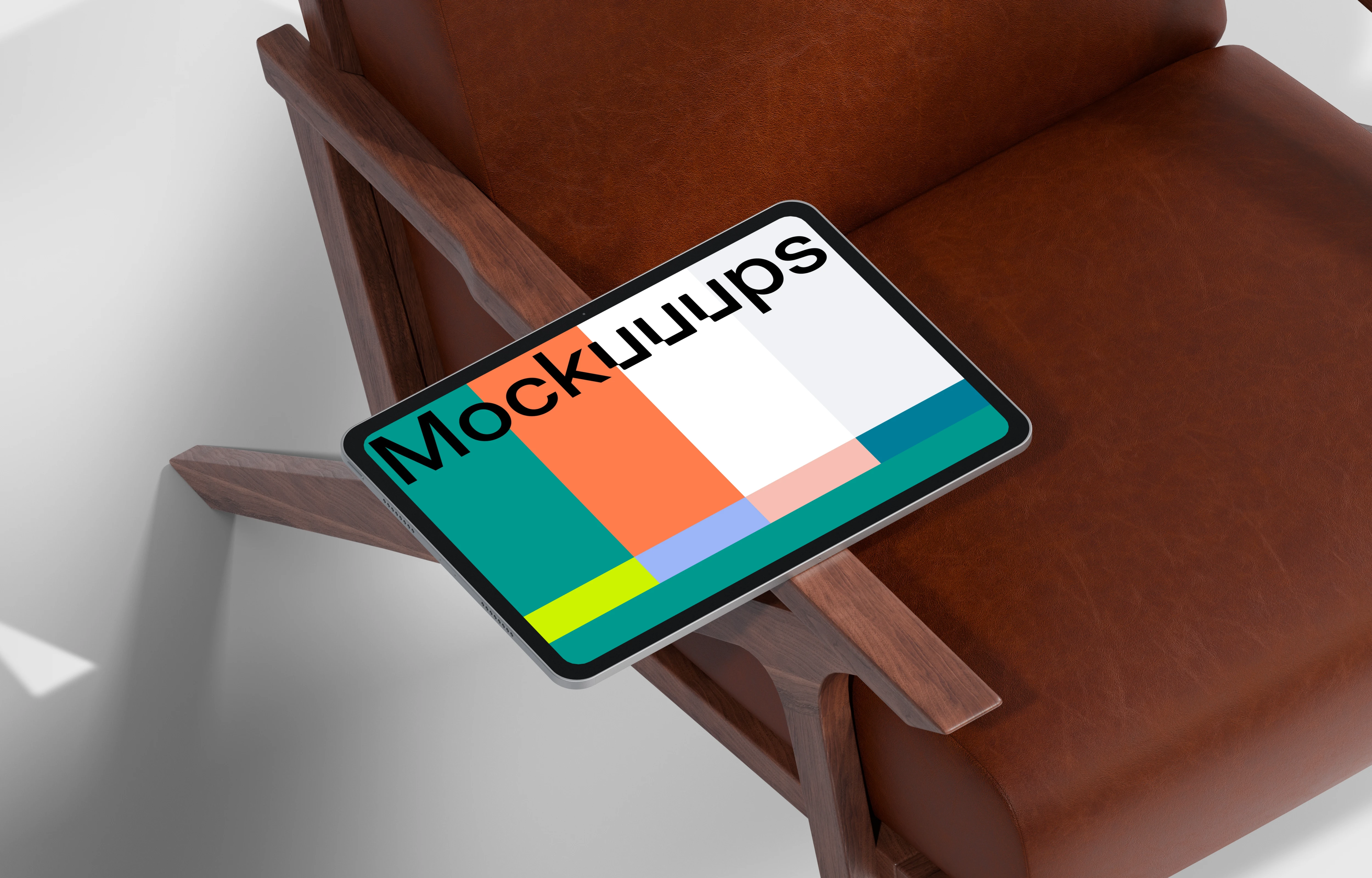 iPad Pro mockup on a modern leather chair