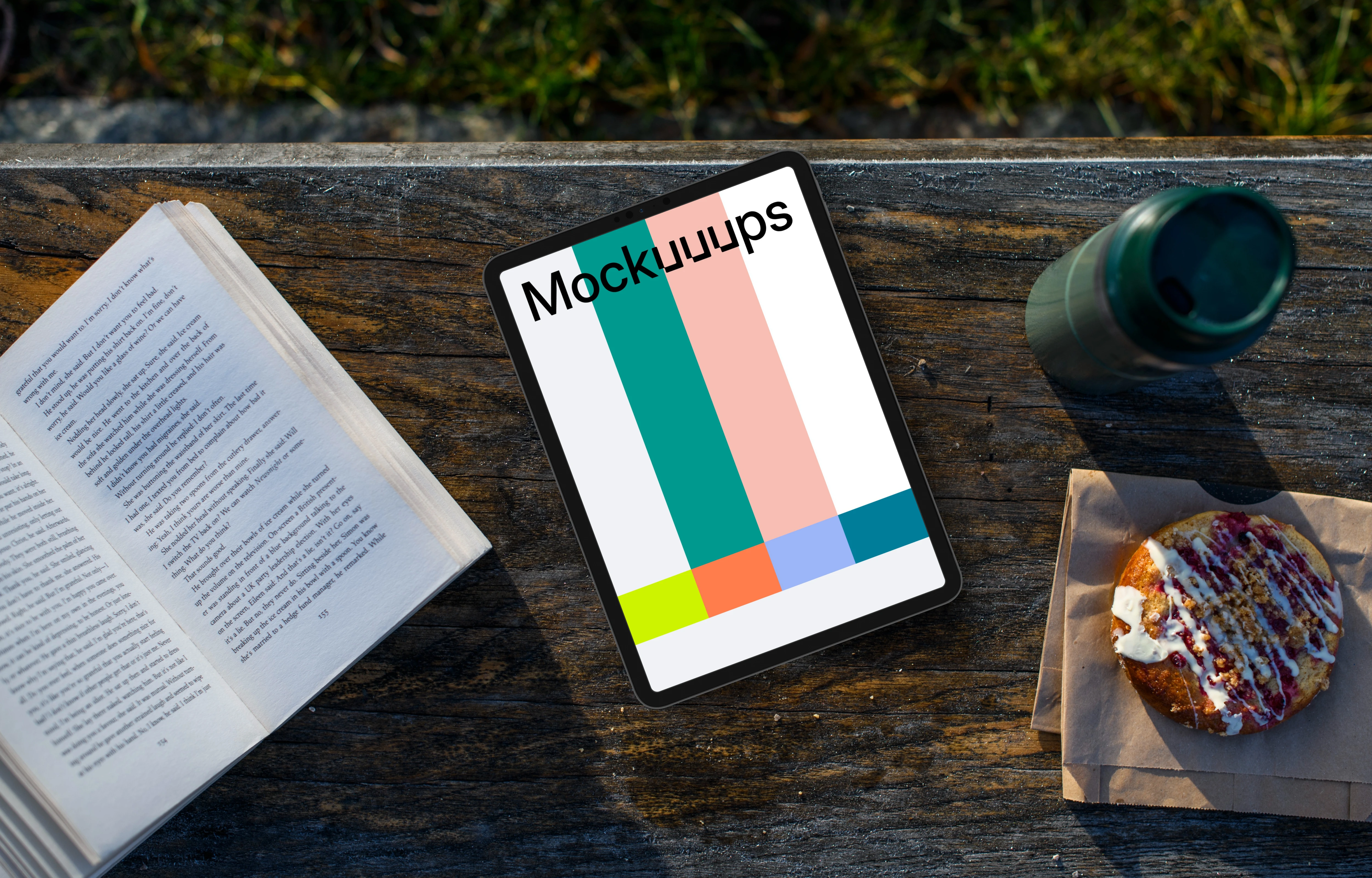 iPad Pro mockup on the outdoor bench