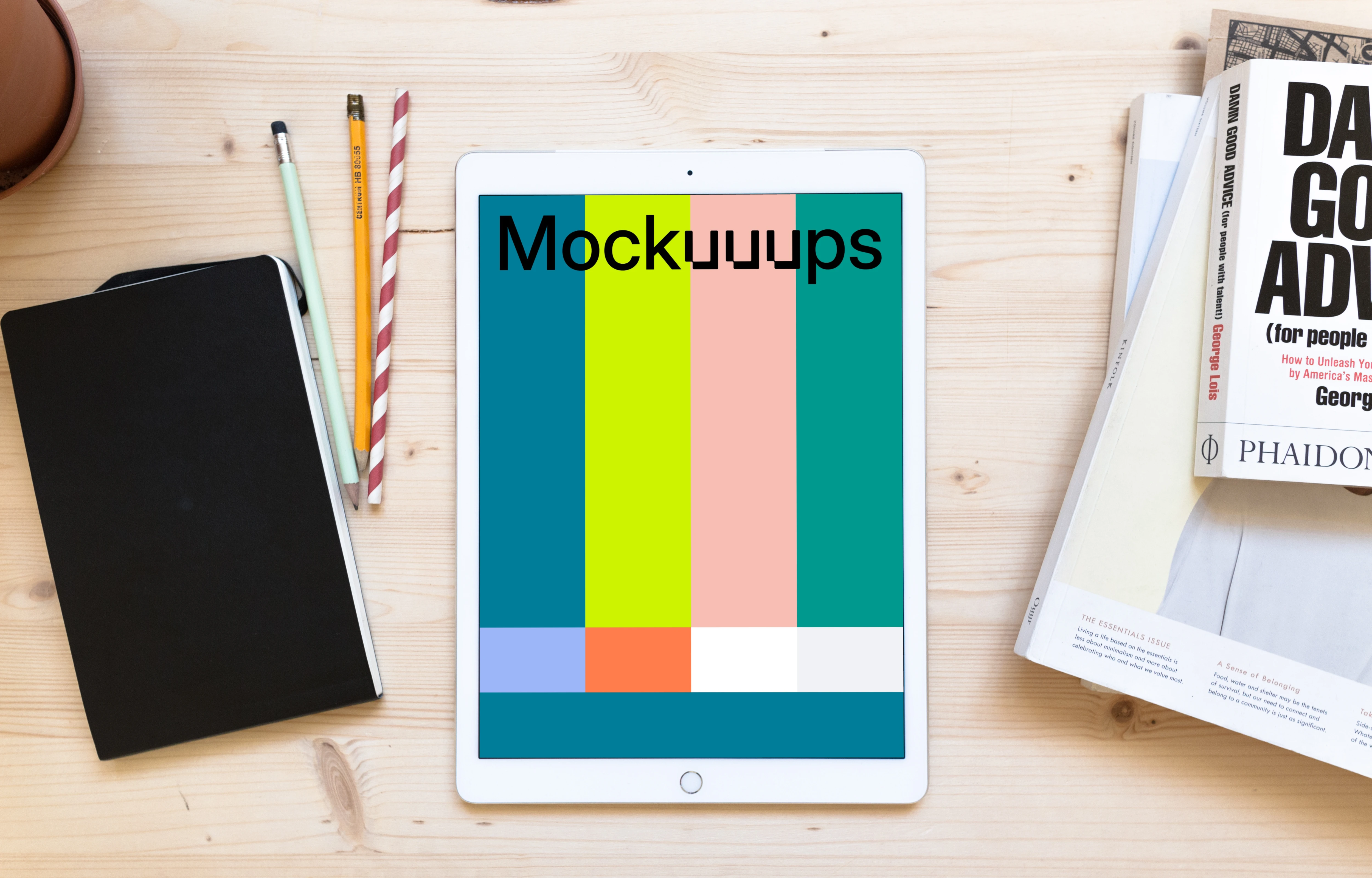 iPad Pro mockup on the wooden working desk