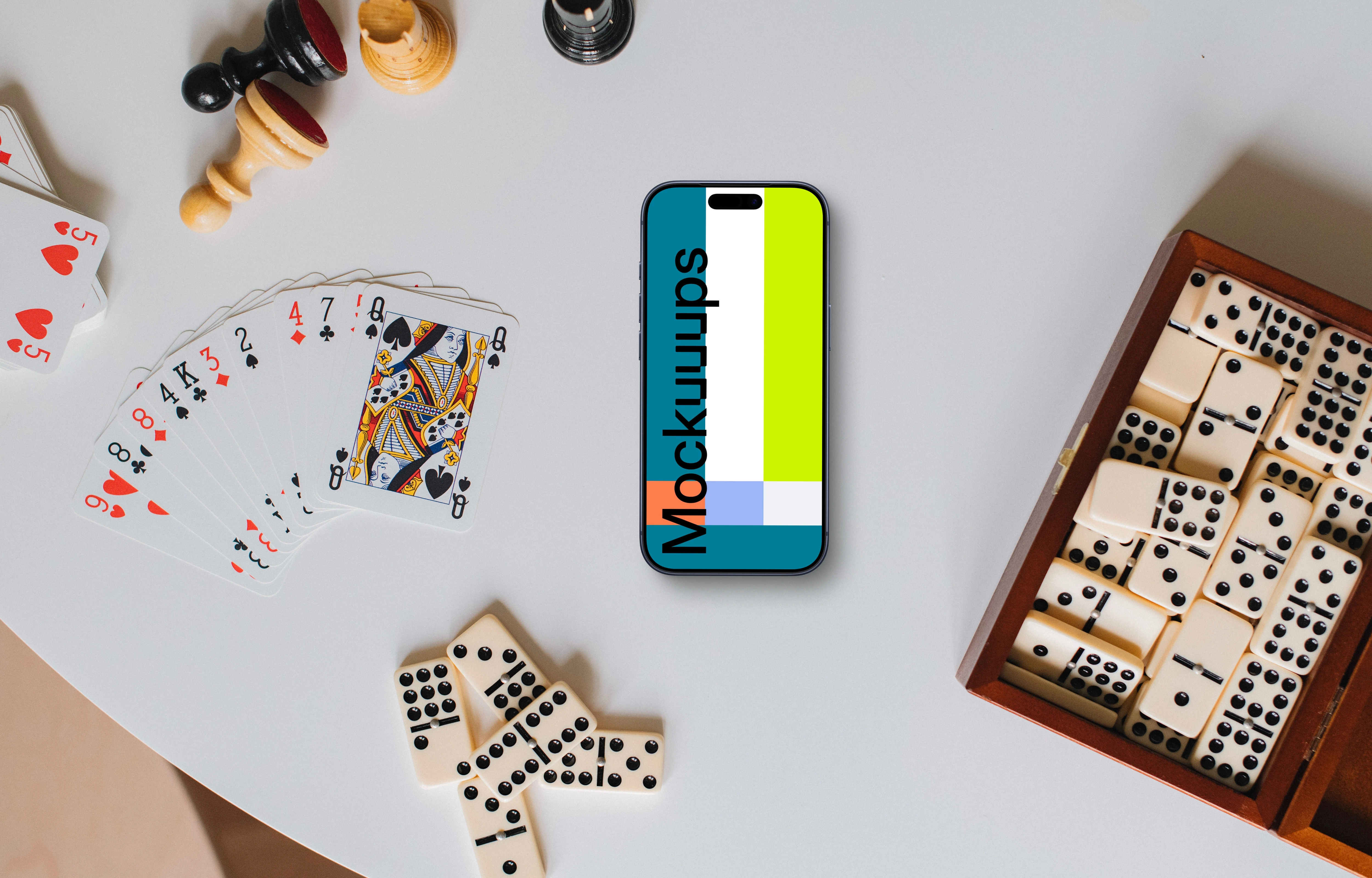 iPhone mockup surrounded by board games