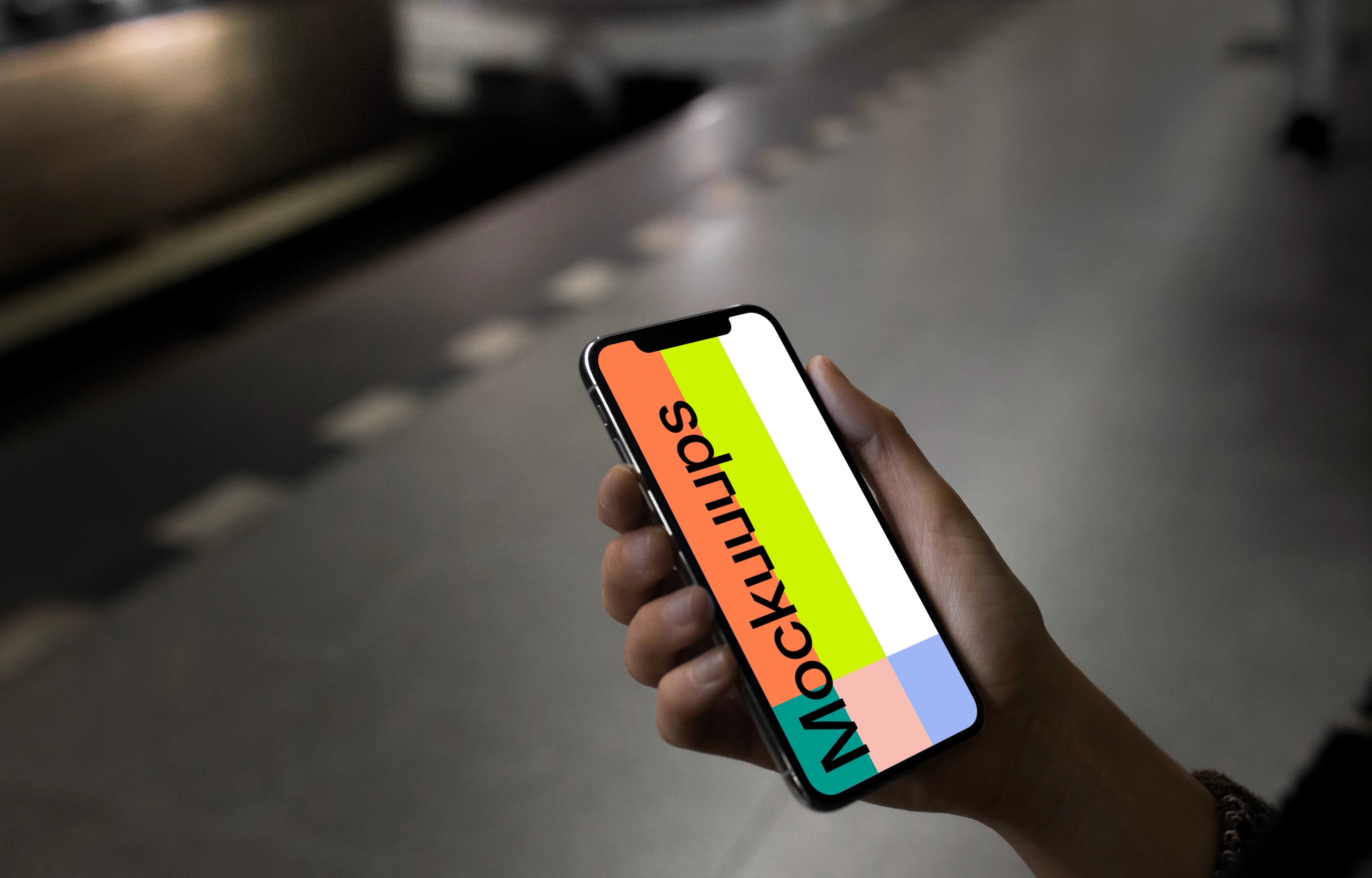 iPhone X mockup in the underground