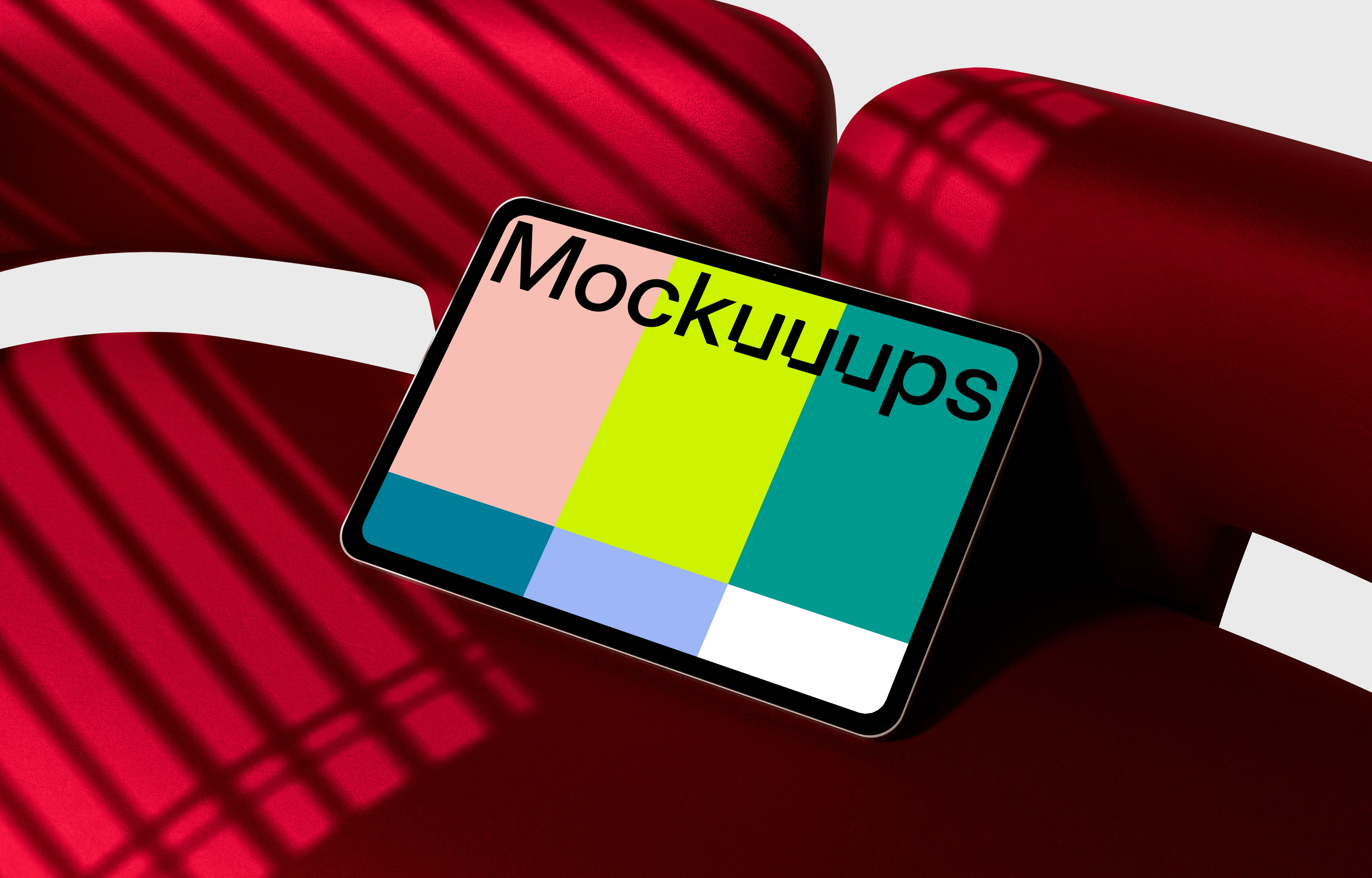 Landscape iPad Pro mockup on a red modern chair