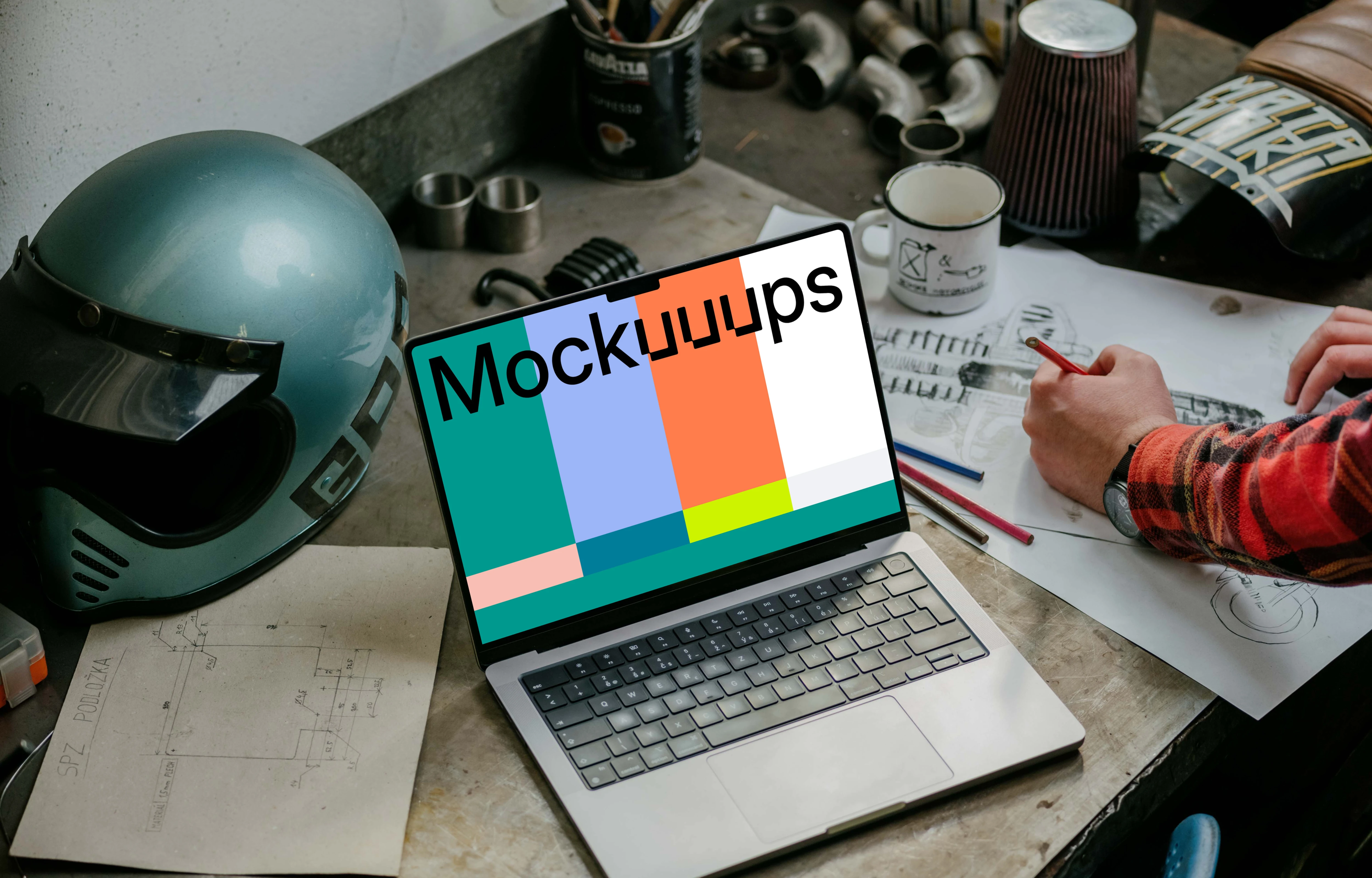 MacBook Pro mockup beside machine drawing