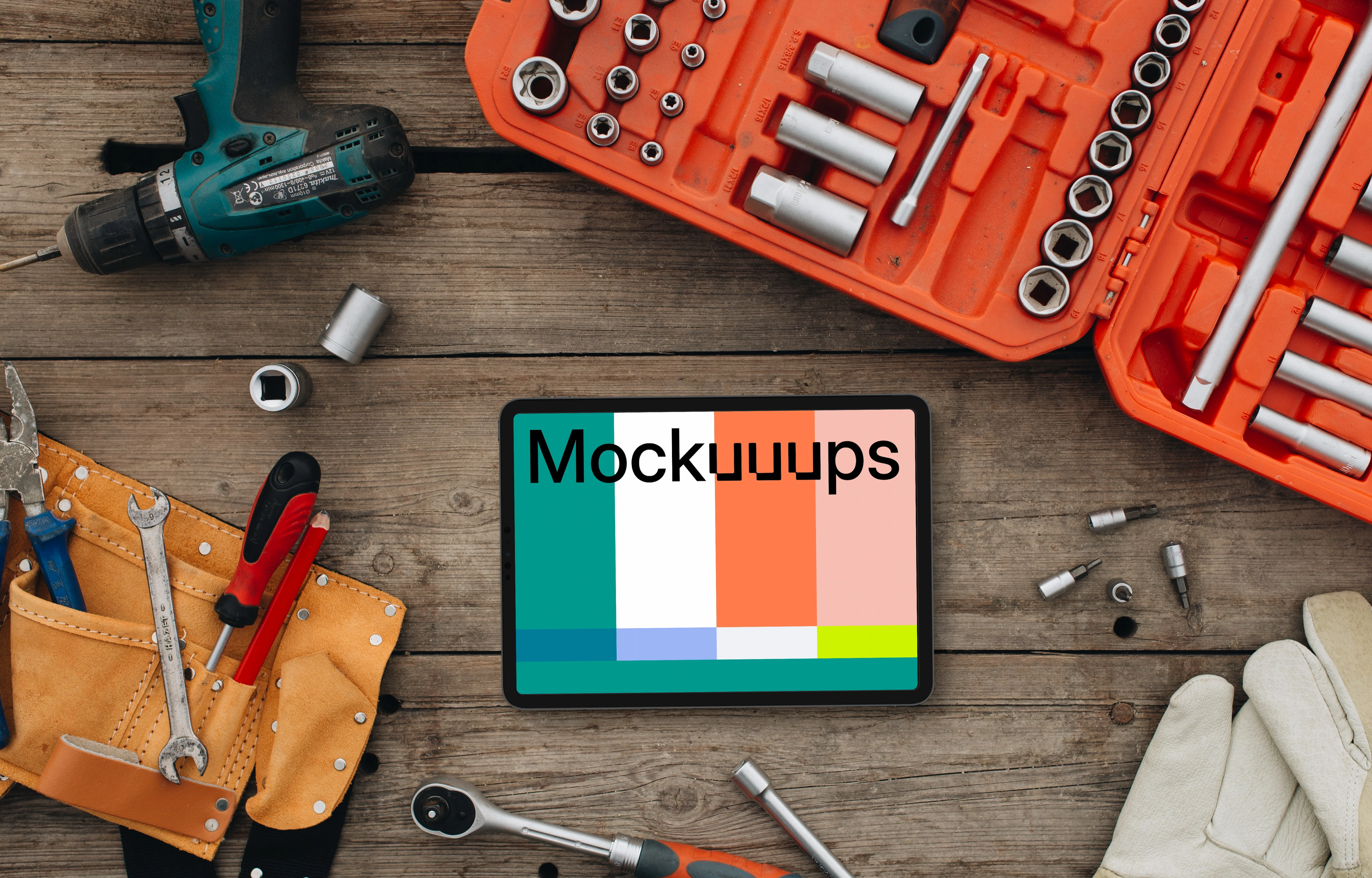 Tablet mockup surrounded by workshop tools