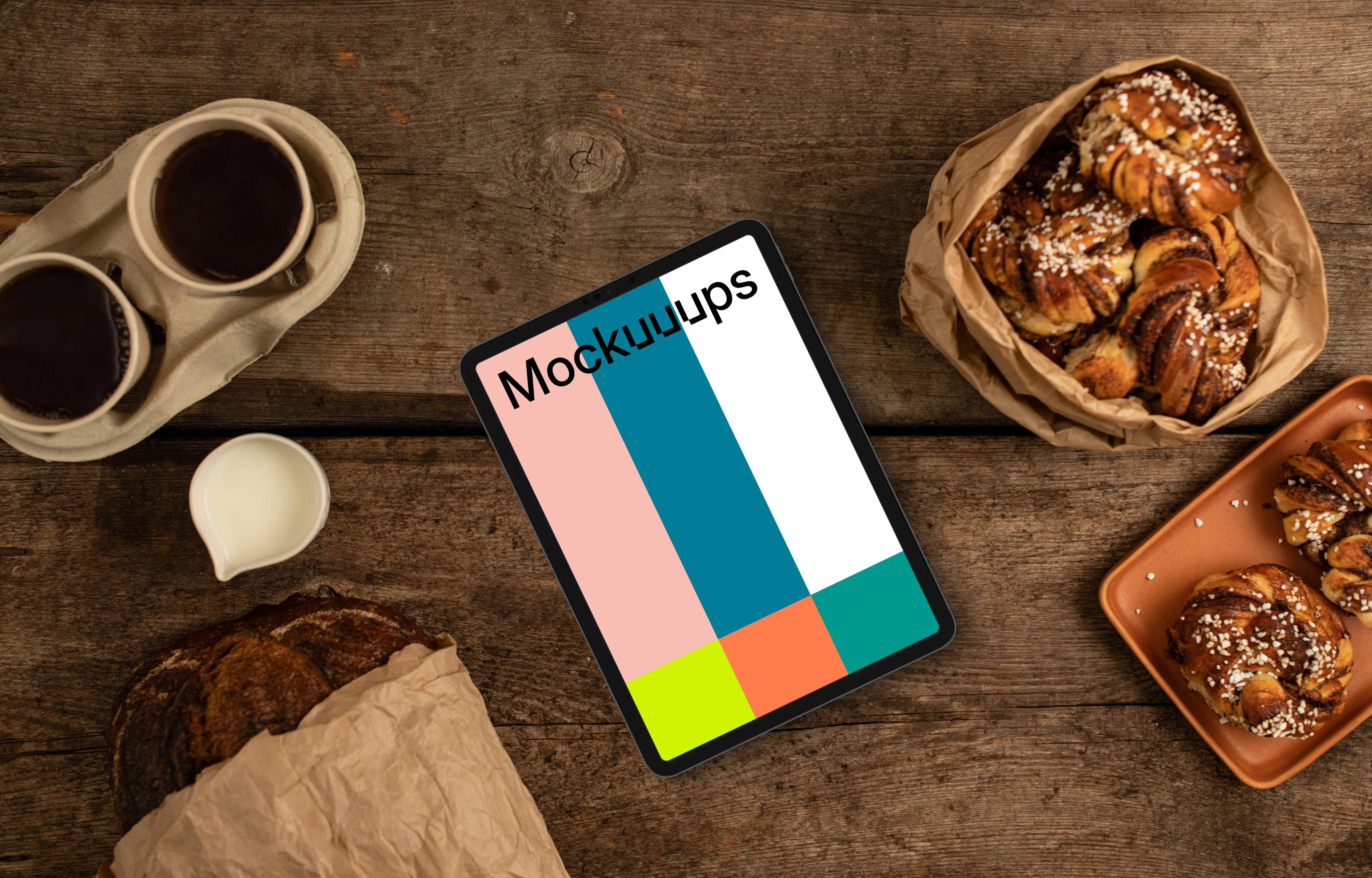 Tablet mockup with pastries and coffee