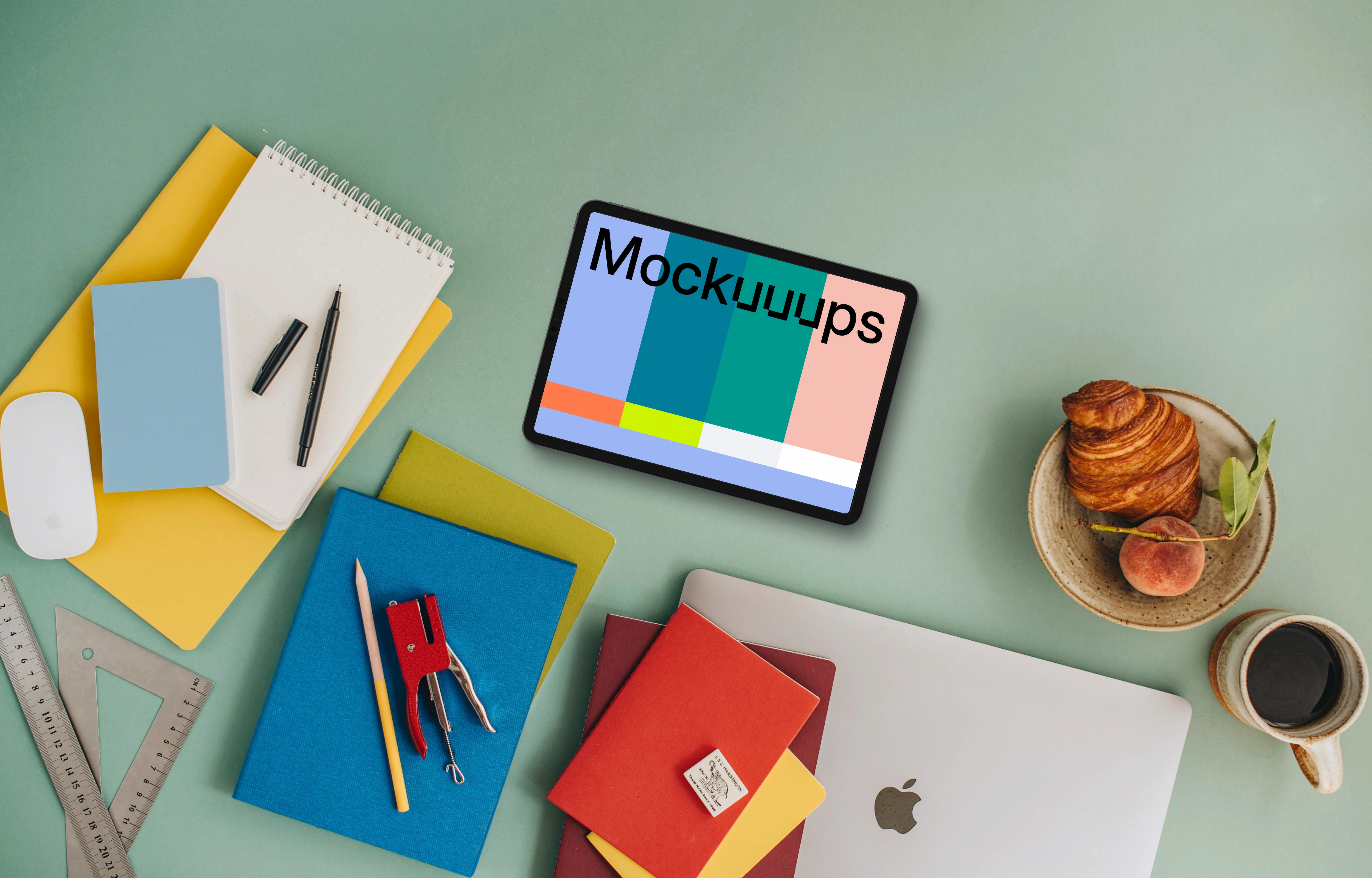 Top view of tablet mockup with school elements around