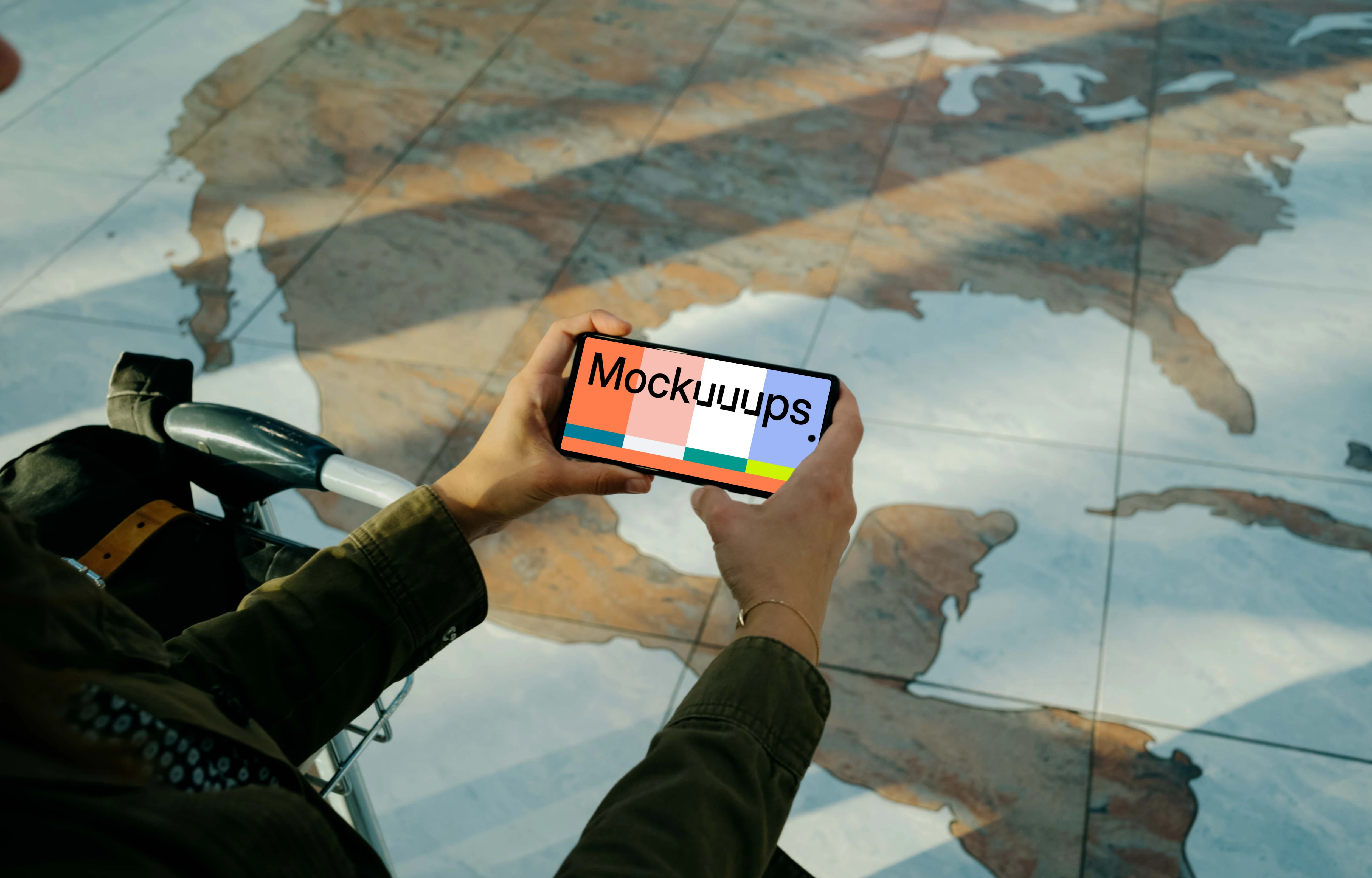 User holding a phone mockup