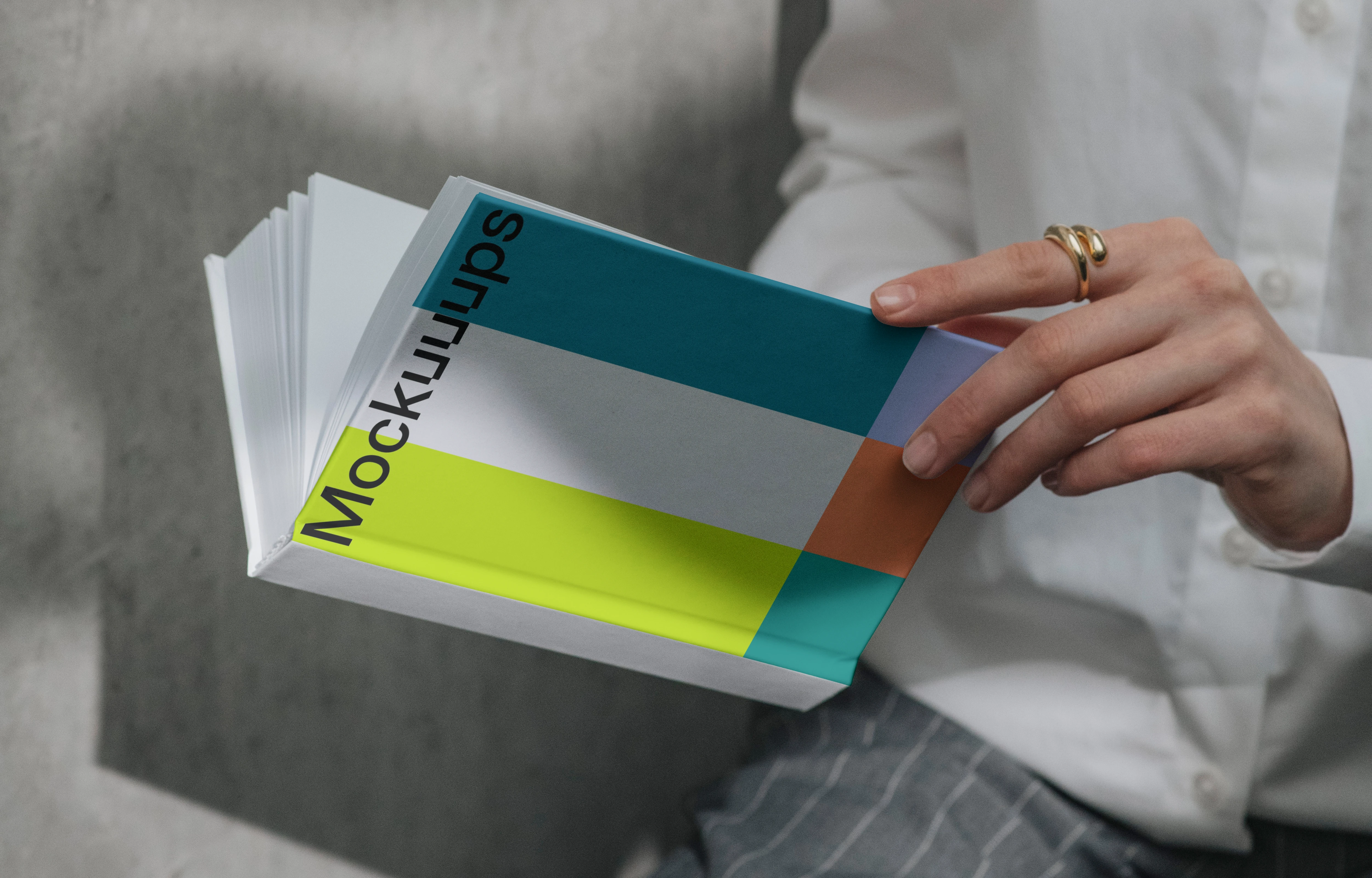 A-format book mockup in a casual setting