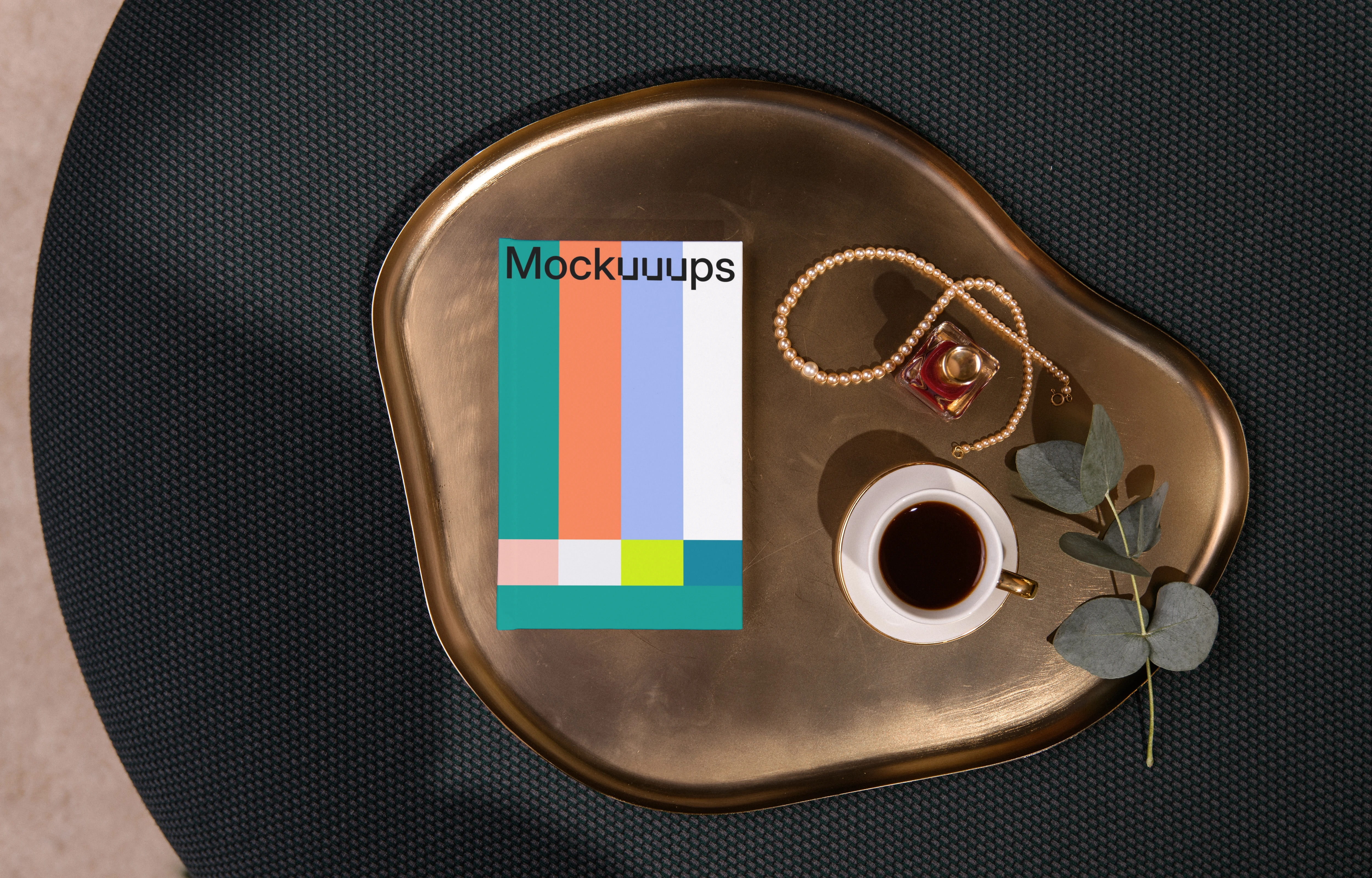 A-format book mockup on a golden tray with coffee and accessories