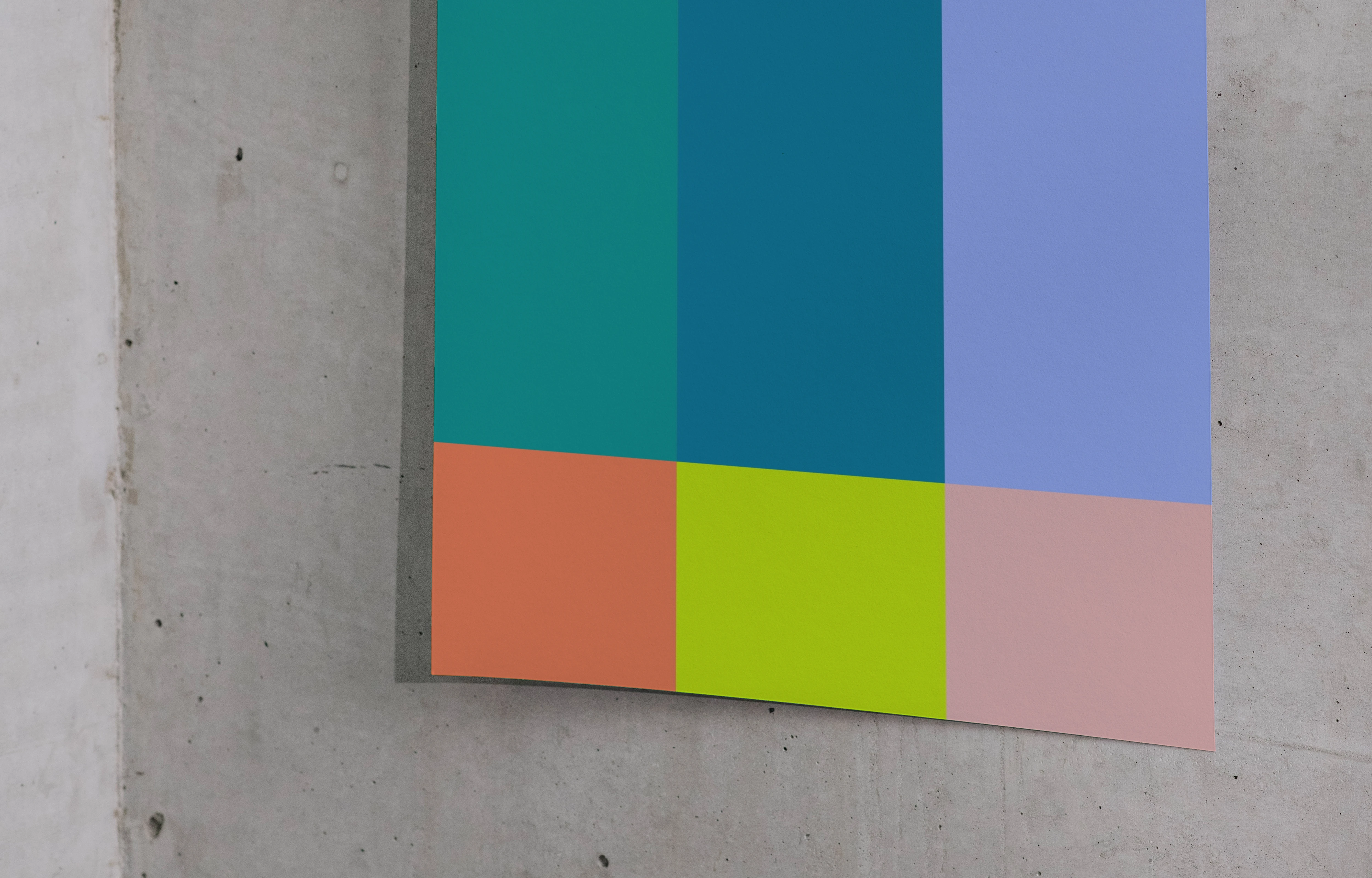 A3 mockup taped to a concrete wall