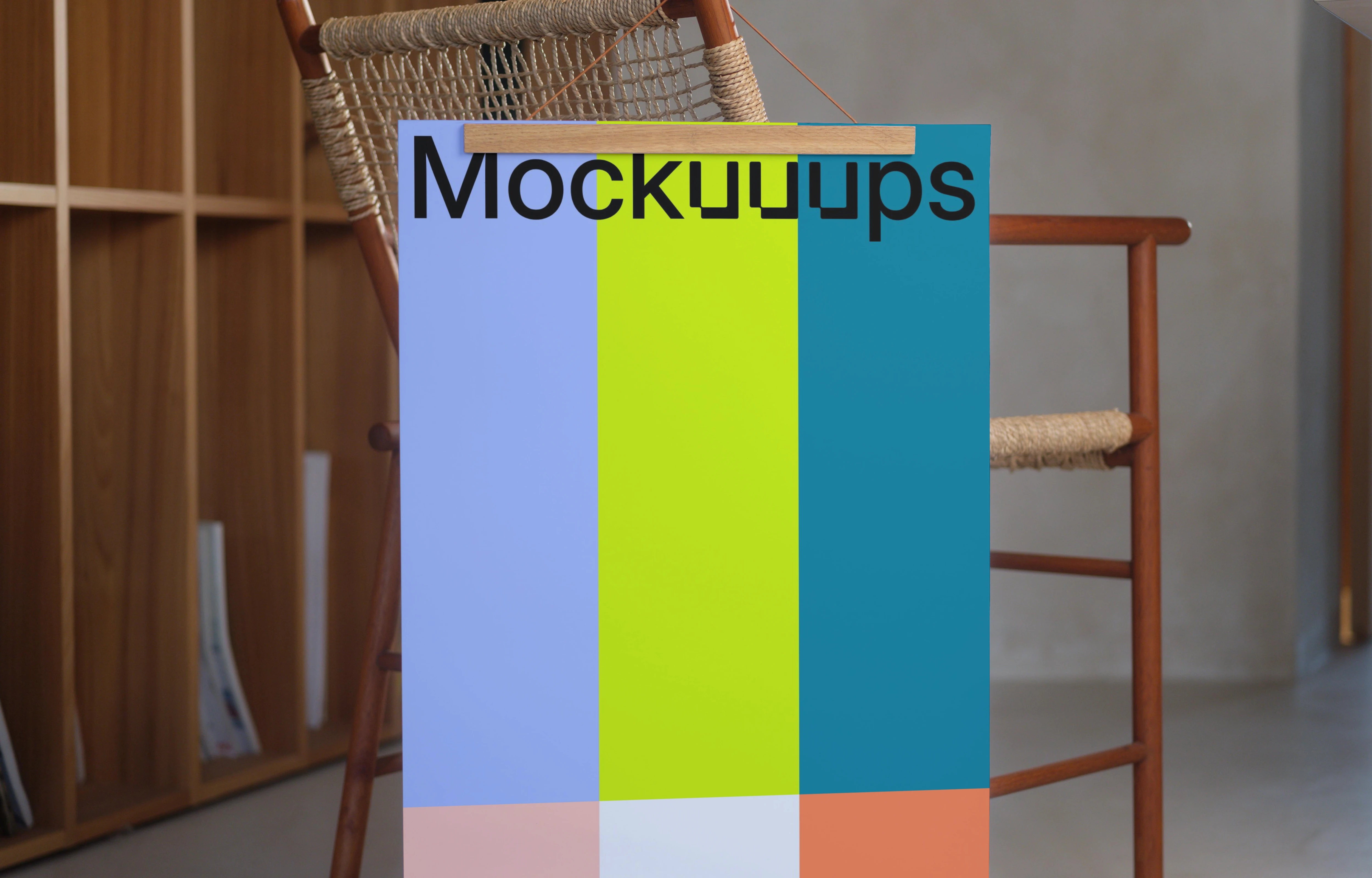 A3 poster mockup on a wooden chair in a cozy interior