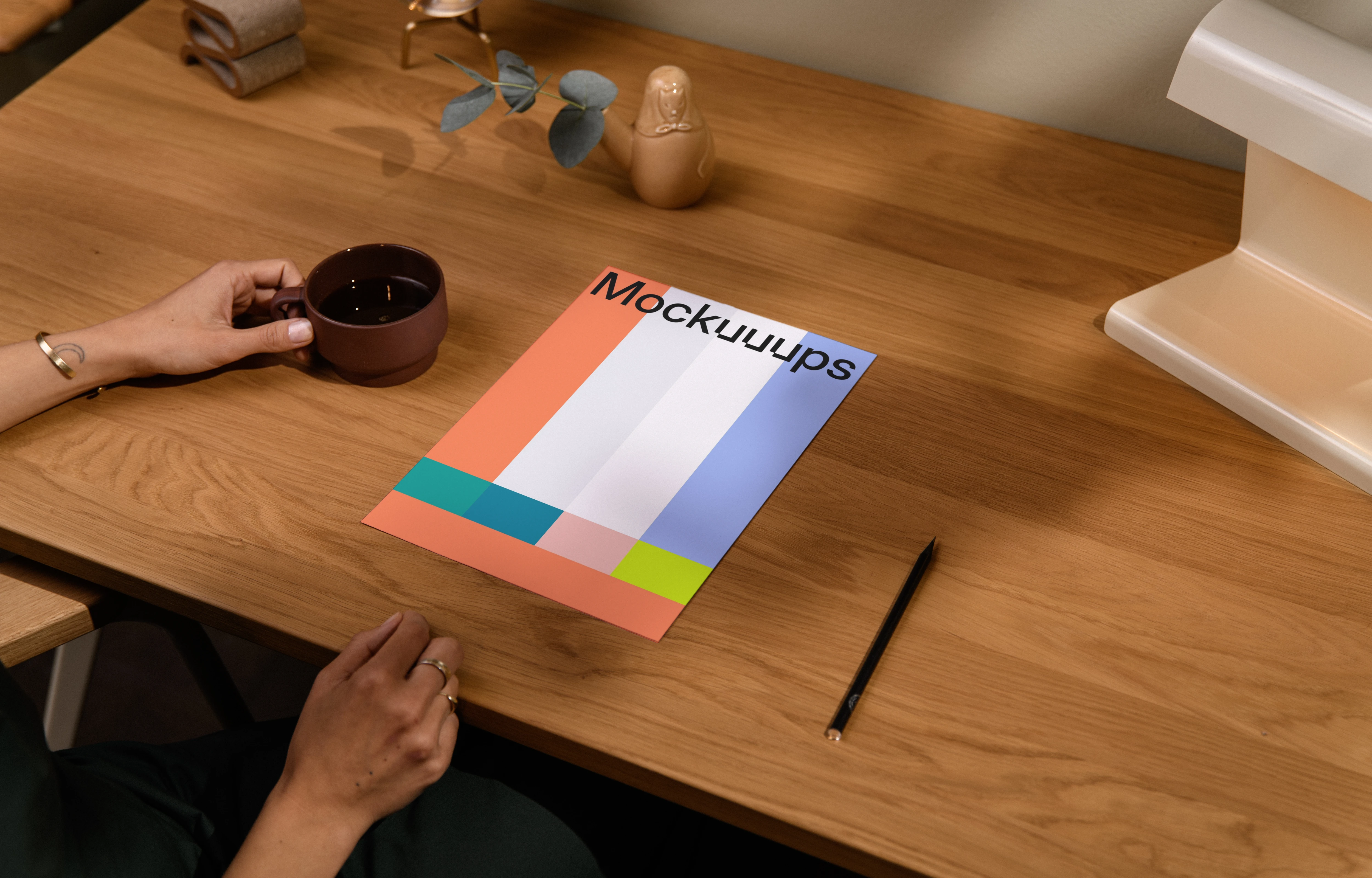 A4 paper mockup on a wooden desk