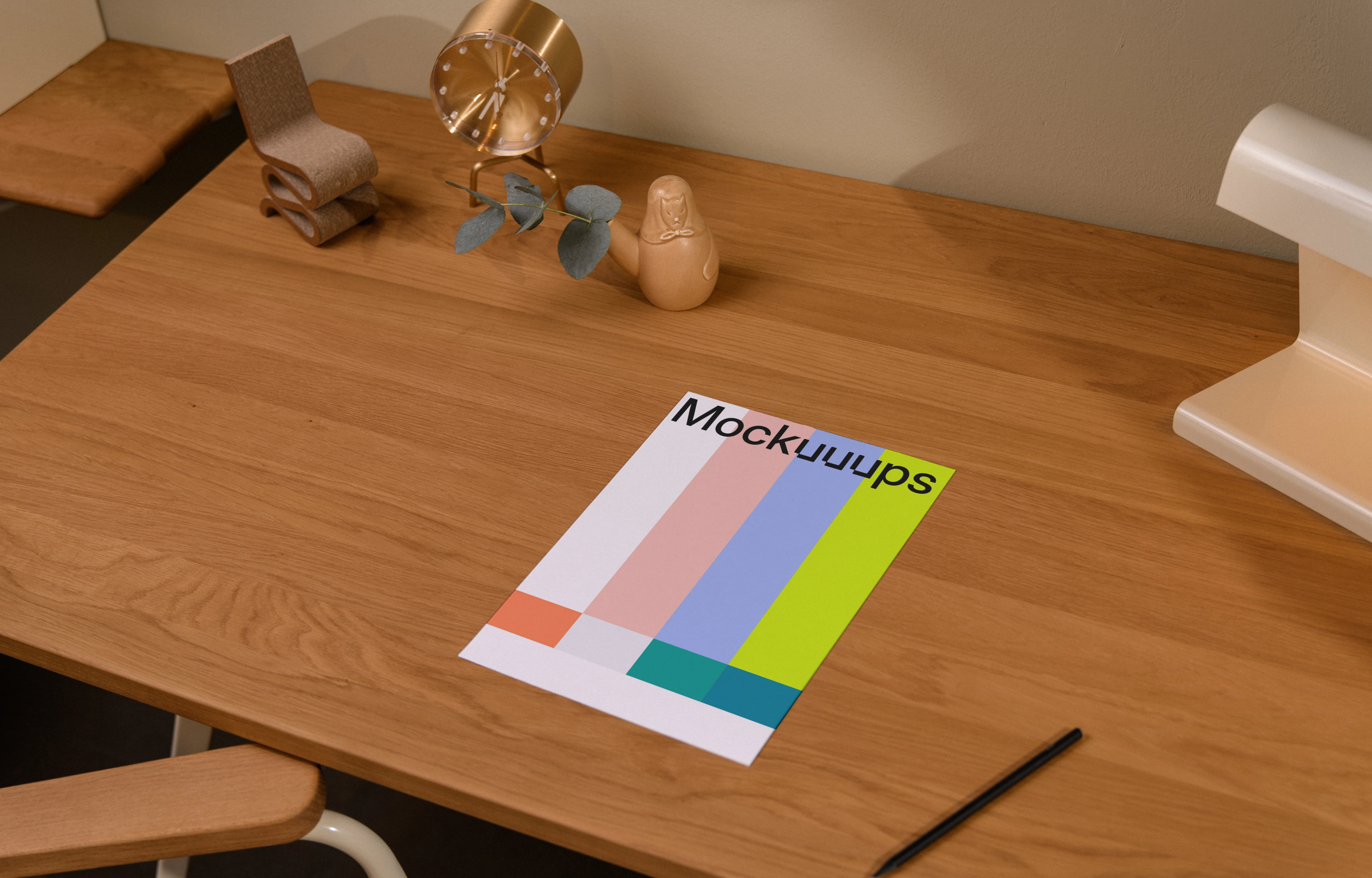 A4 paper mockup on a wooden desk with decor