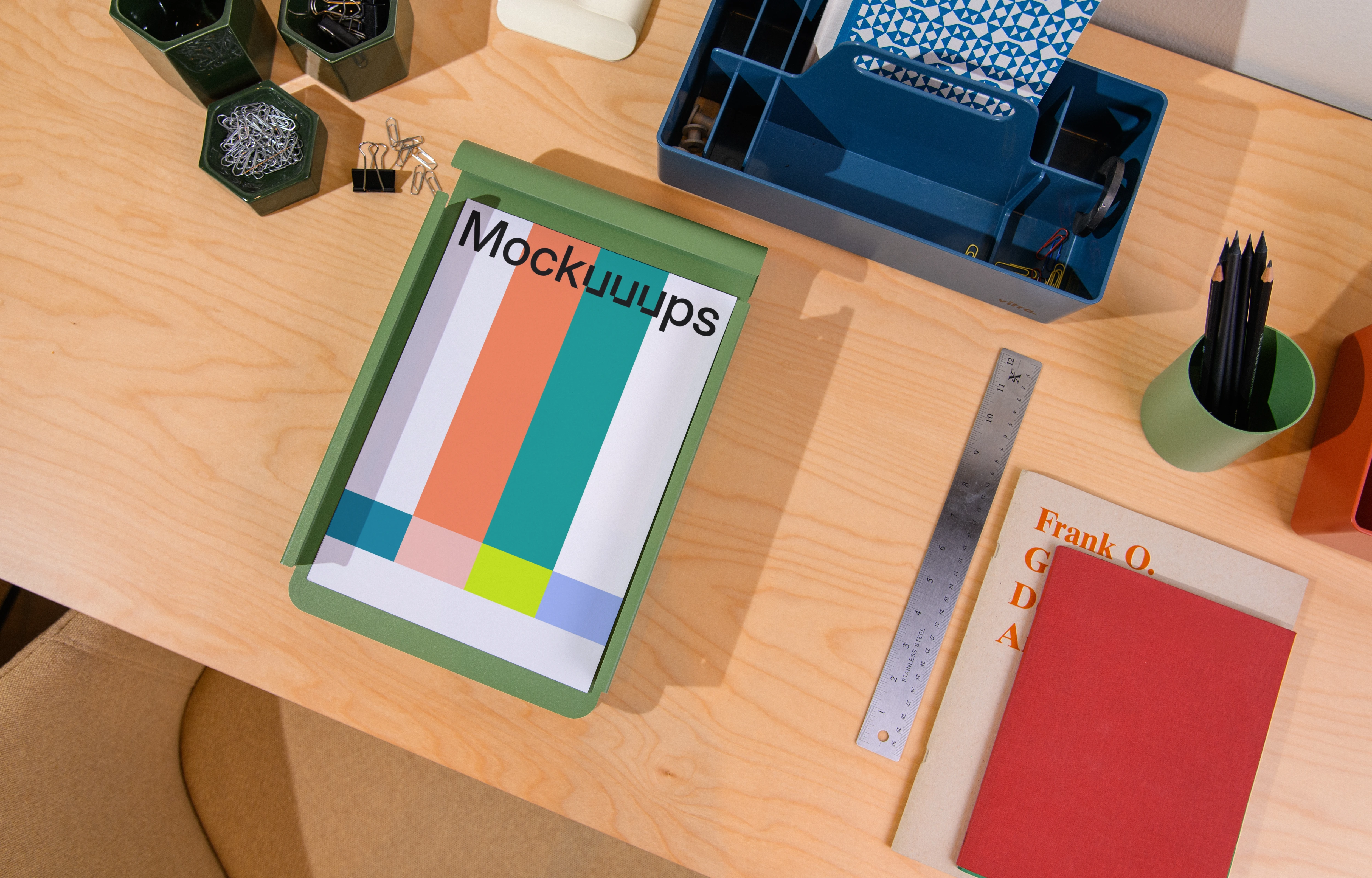 A4 paper mockup on a wooden desk with office supplies
