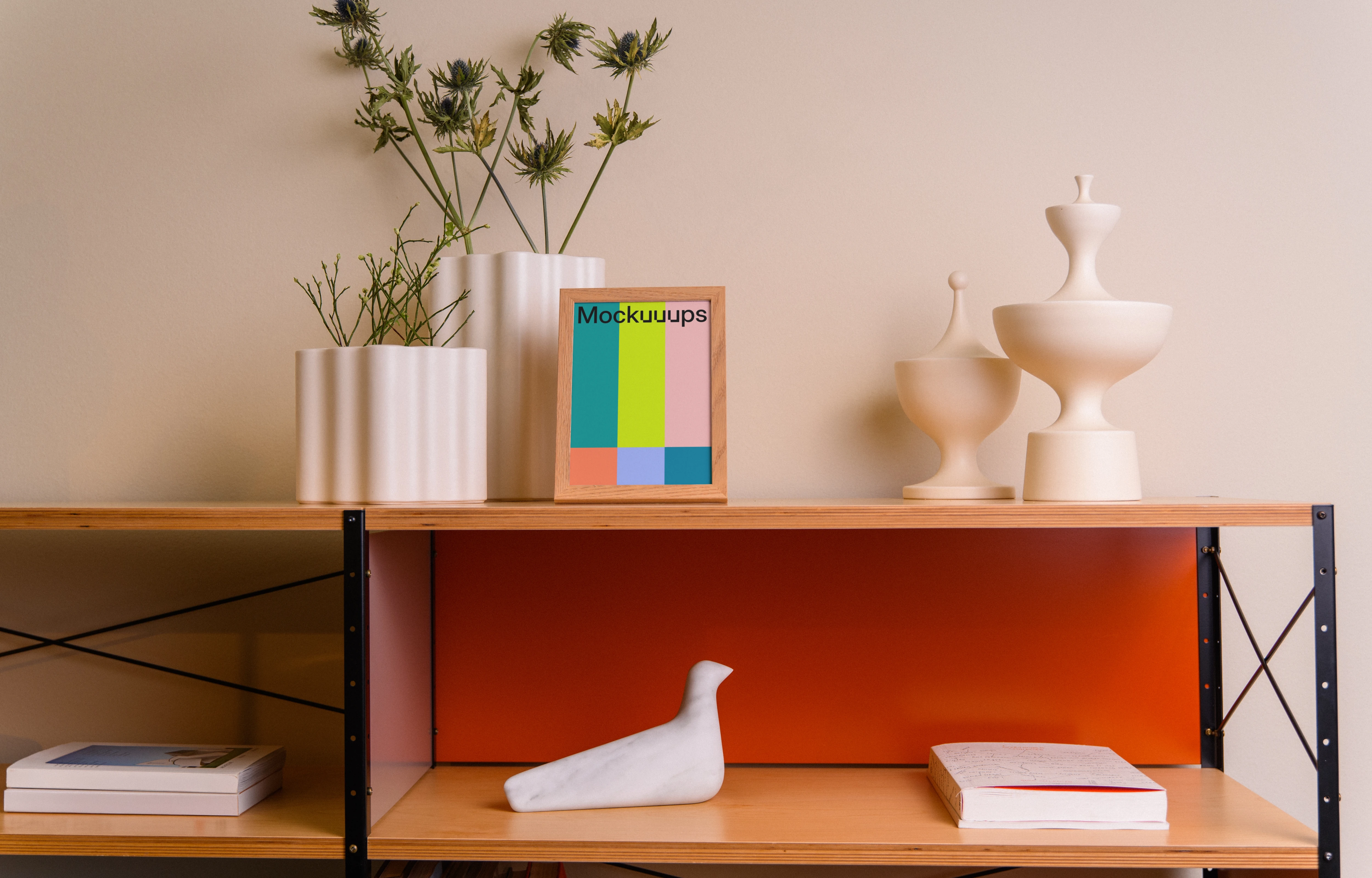 A5 mockup on a wooden shelf with decor