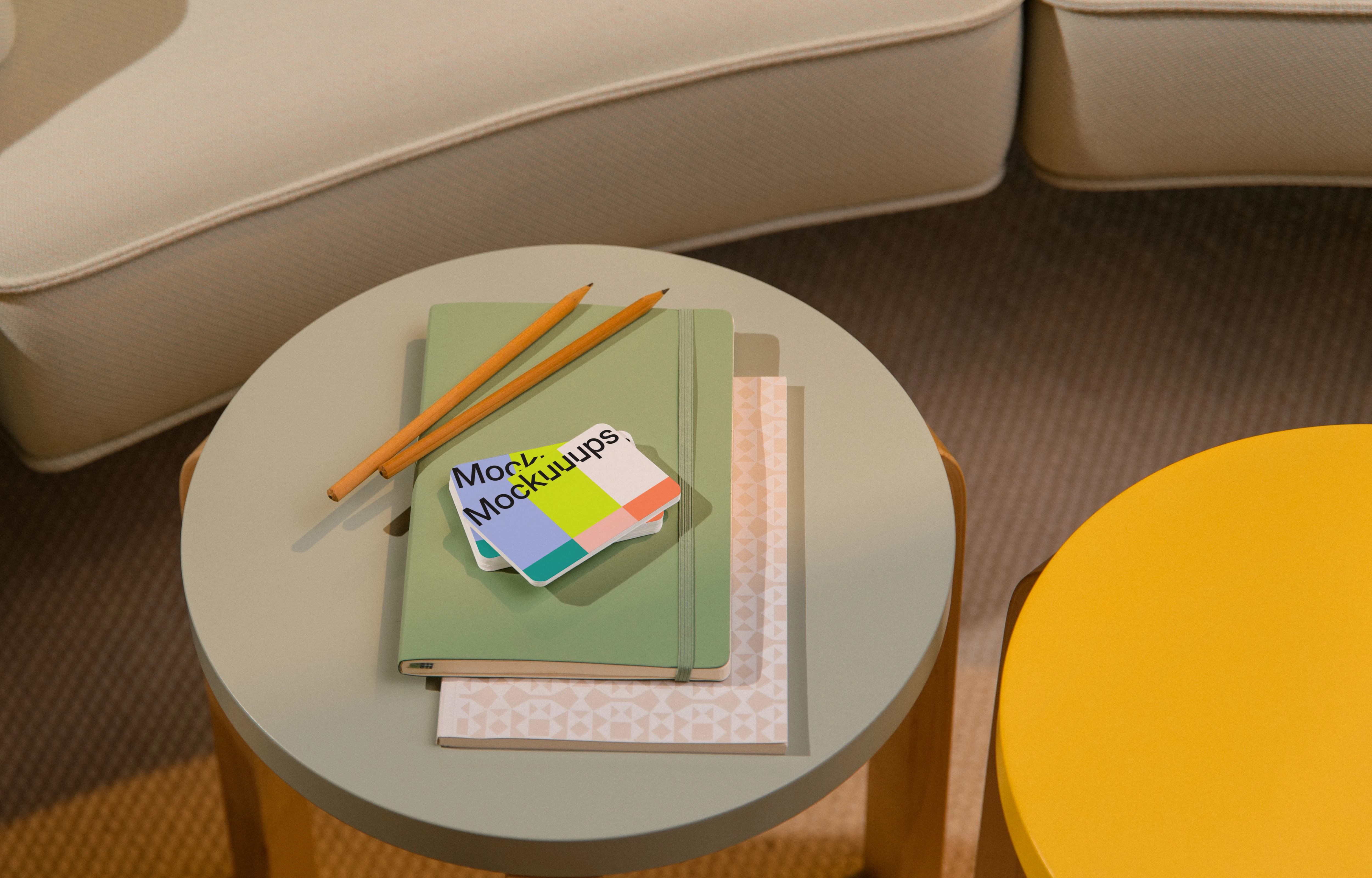 Business card mockup on a small round table