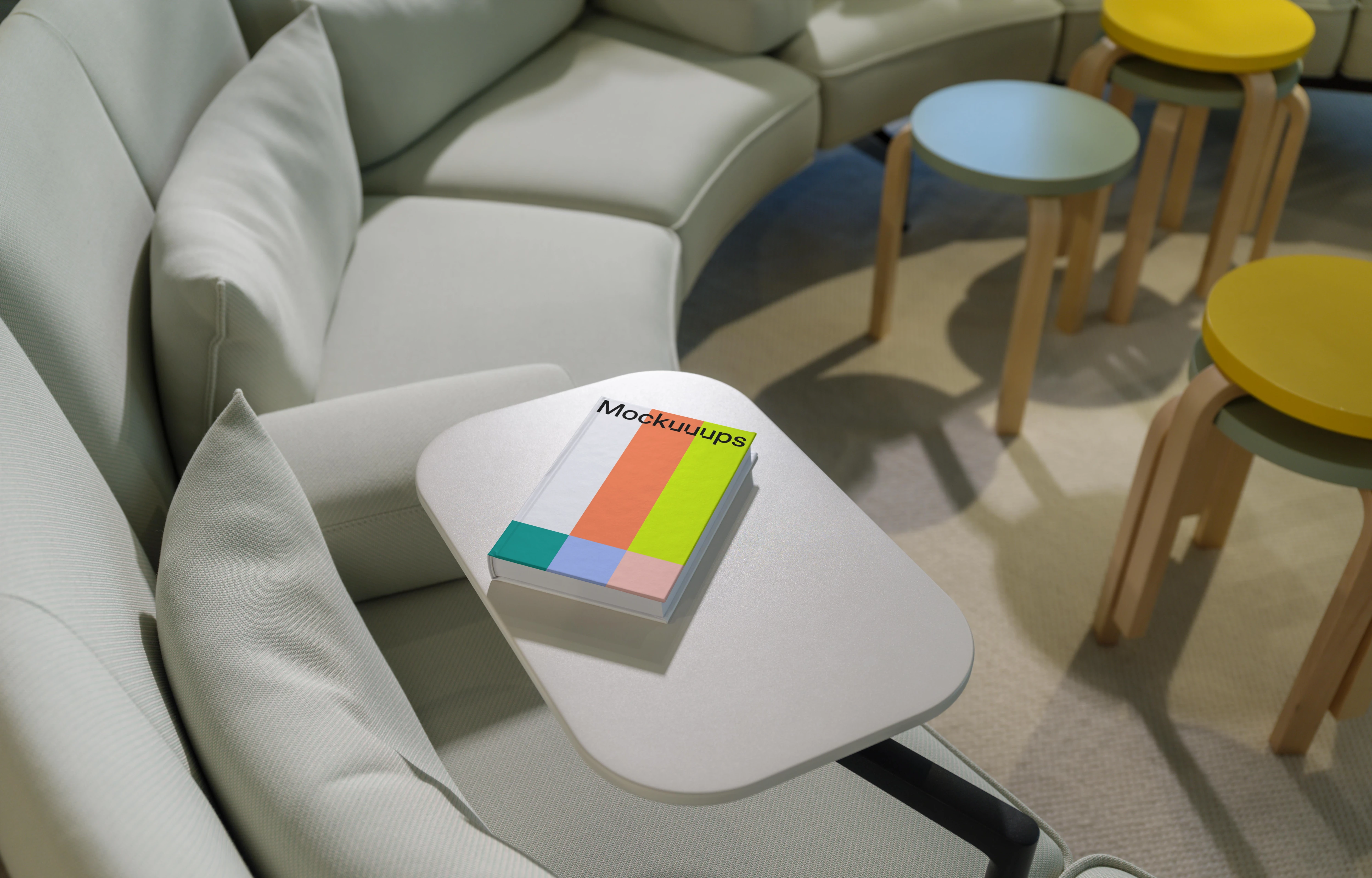 C-format book mockup on a modern lounge table