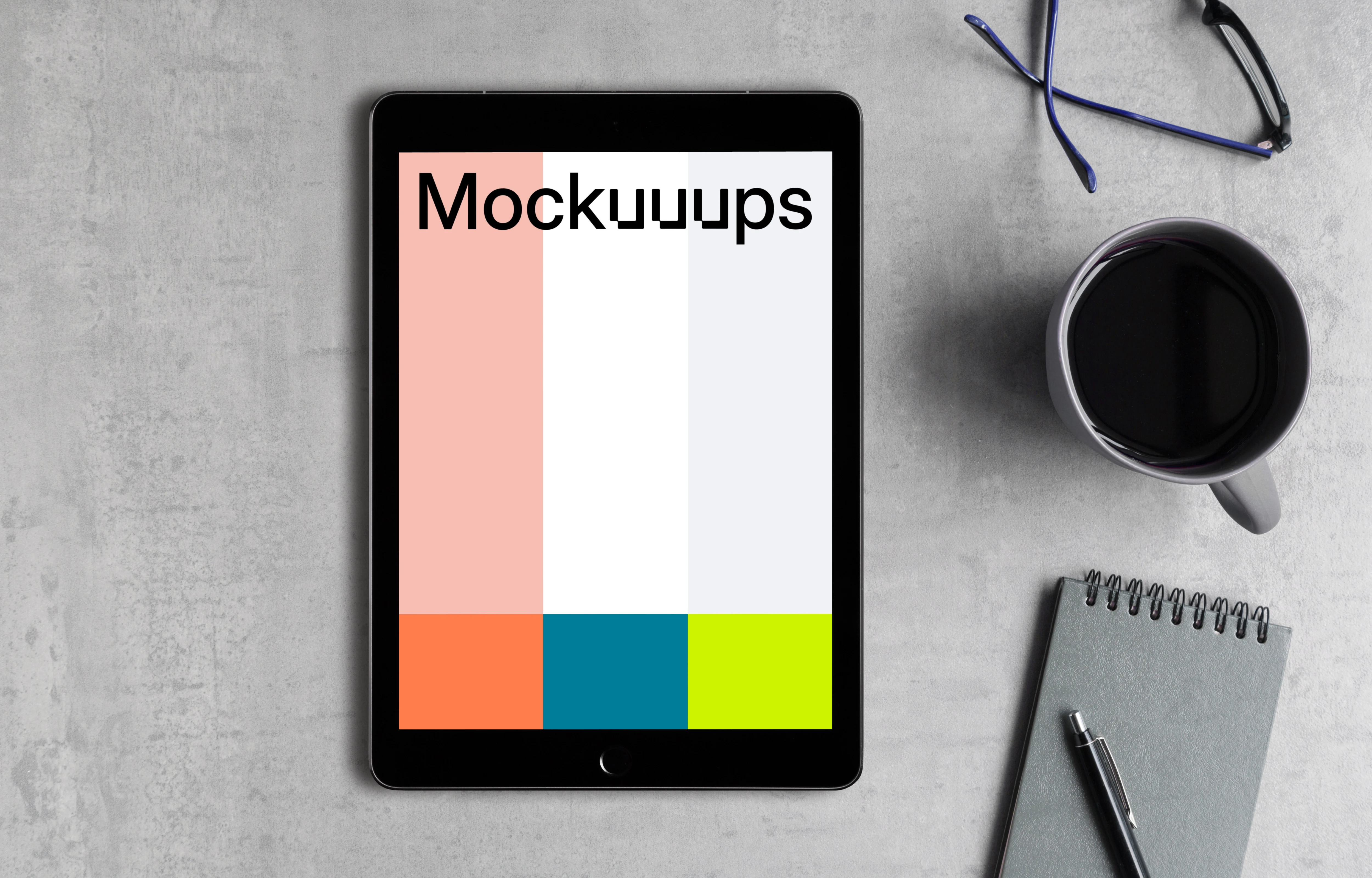 Center view of iPad Pro mockup on the gray table