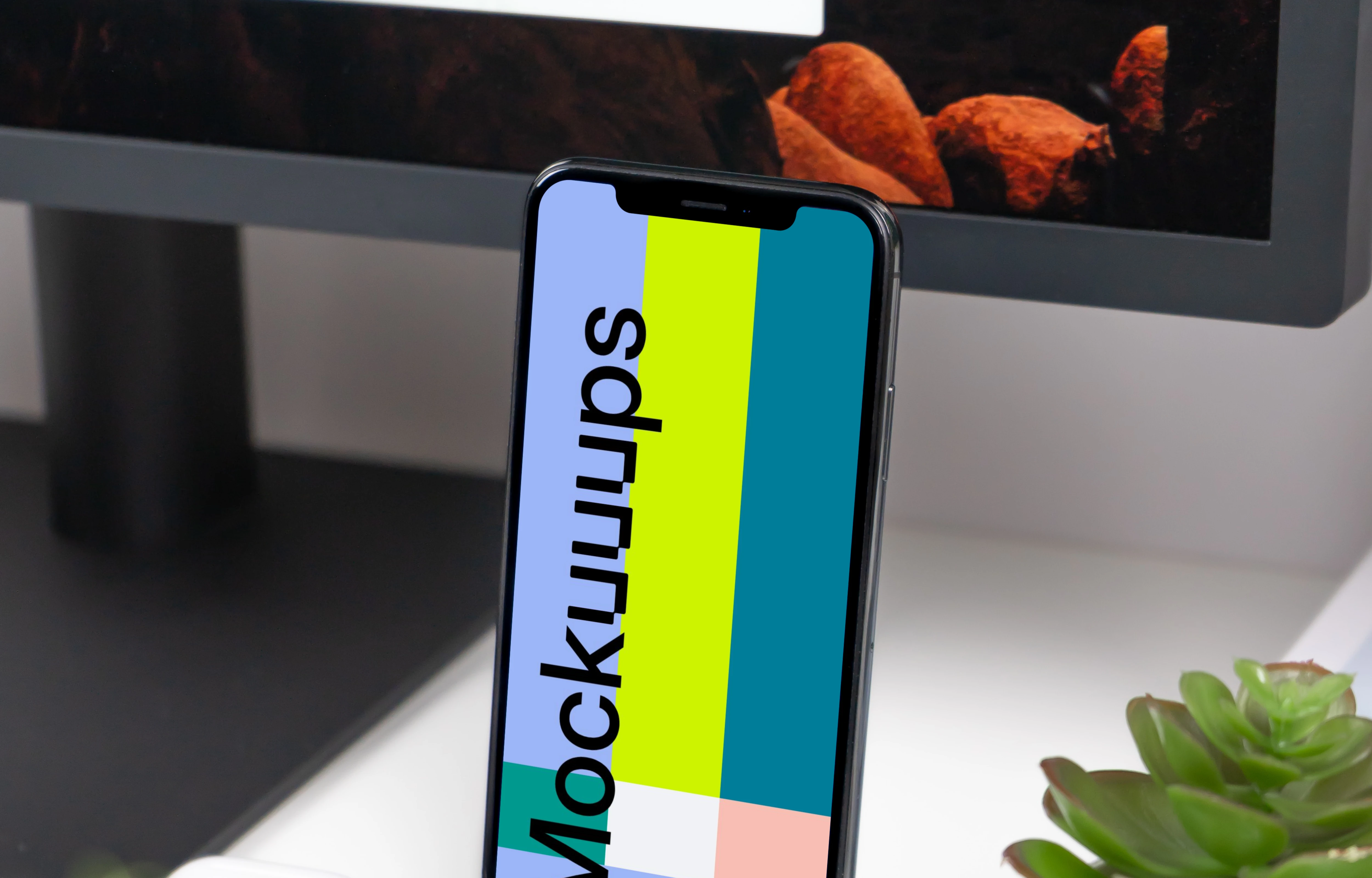 iPhone XS mockup in front of the display