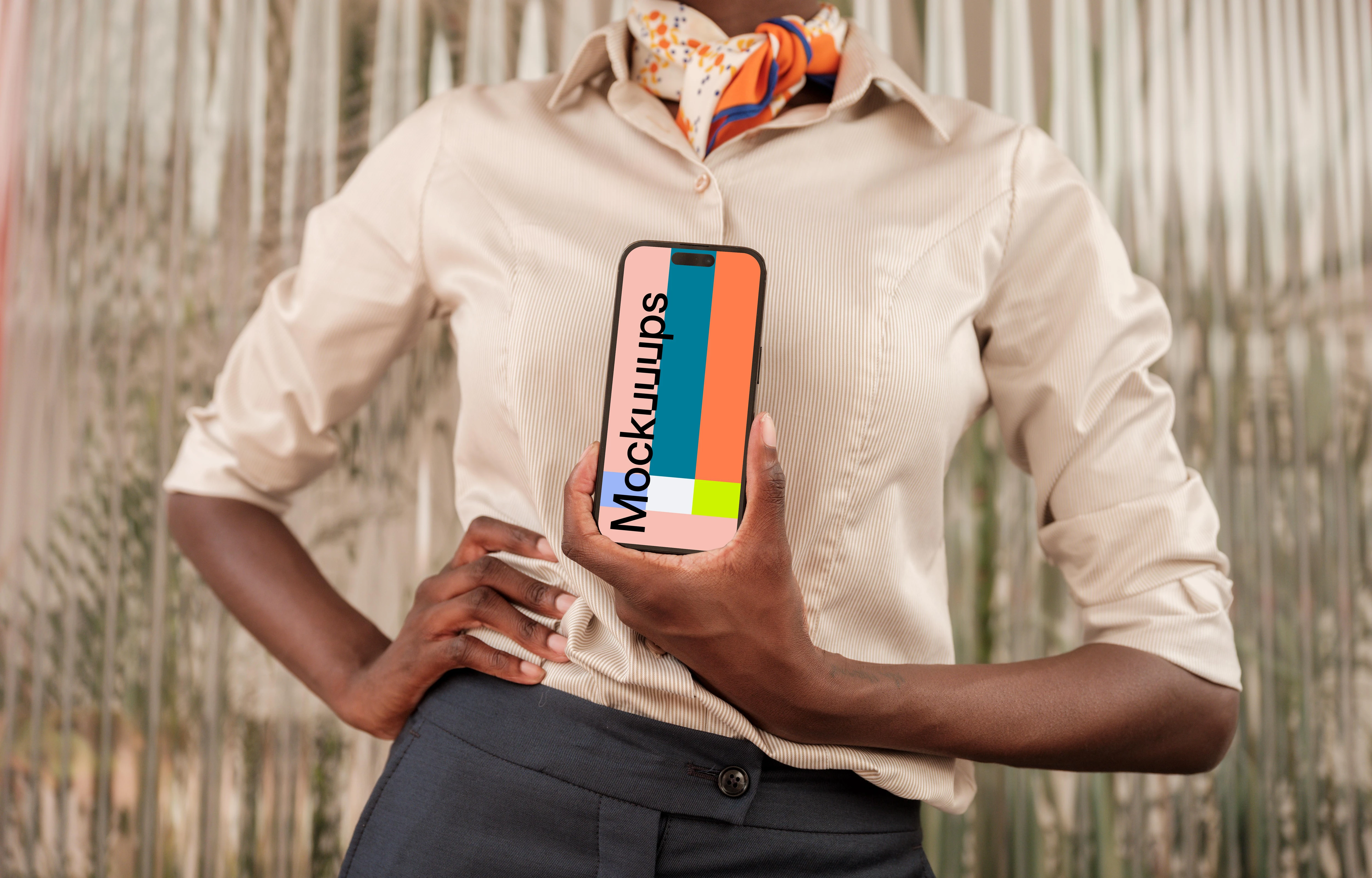 Female entrepreneur holding an iPhone mockup