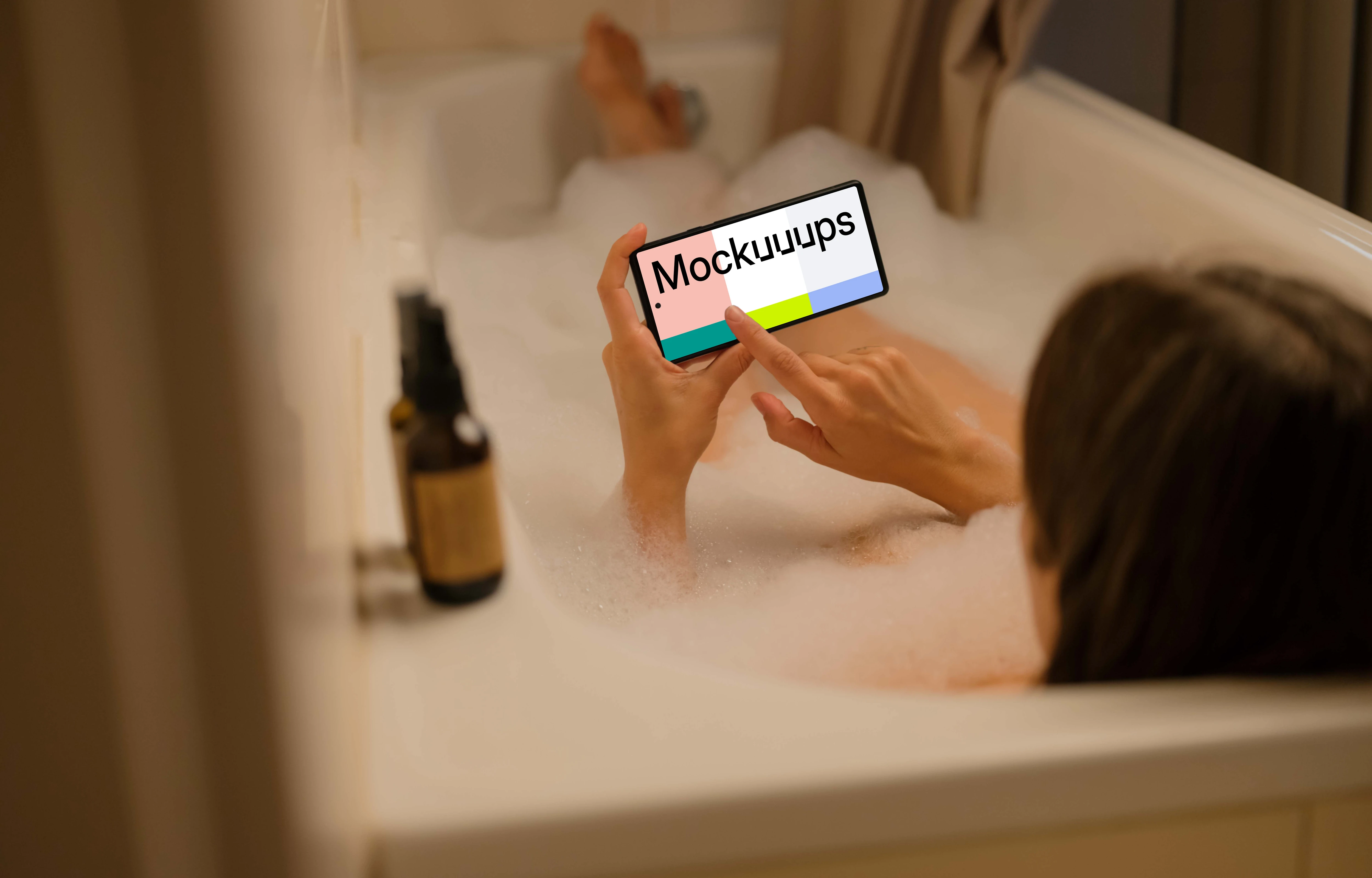 Female in bath typing on a Google Pixel mockup