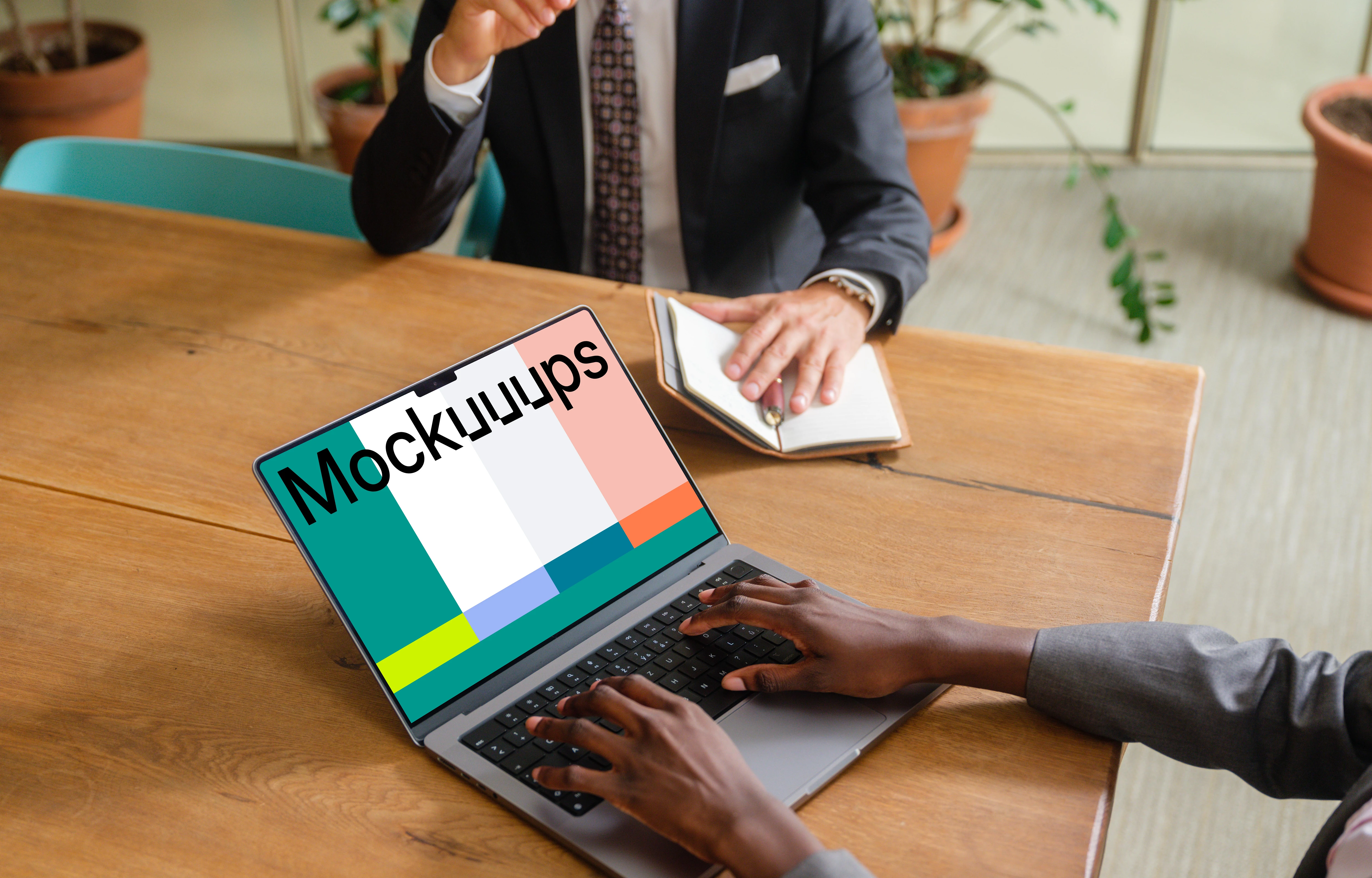 MacBook Pro 14 mockup in the business meeting