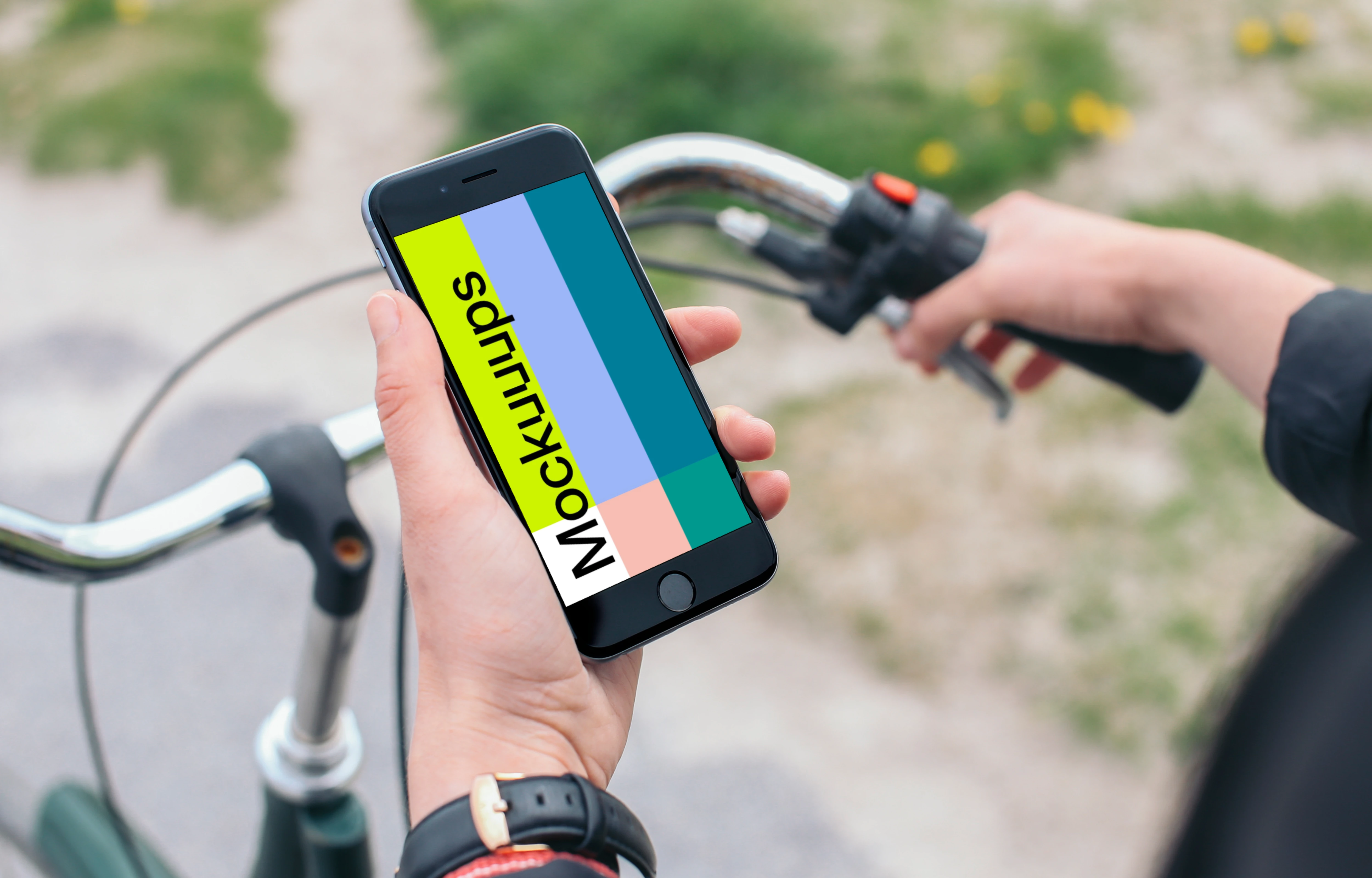 Holding iPhone 6 mockup on a bike