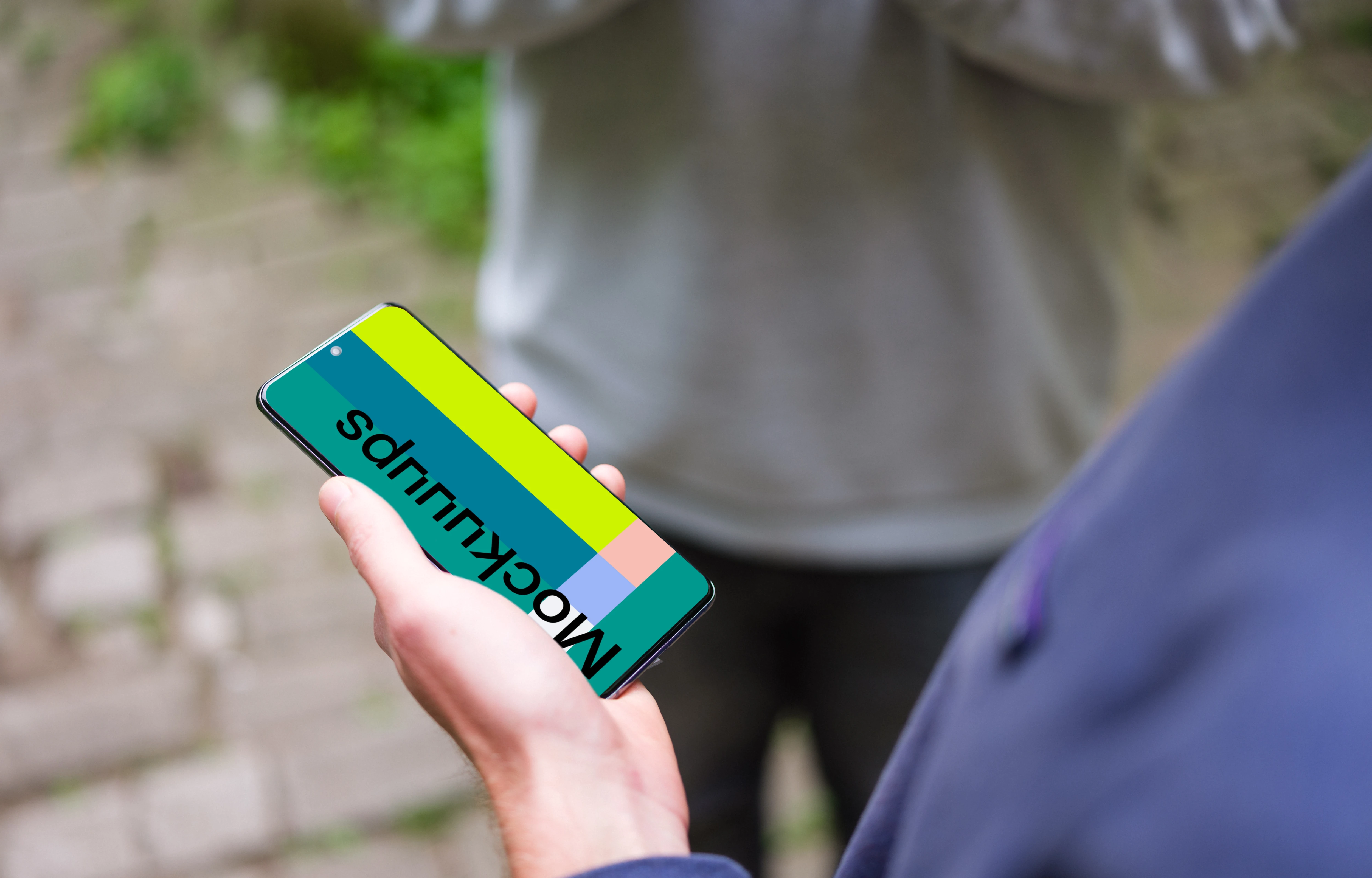 Holding Samsung Galaxy S20 mockup next to a friend