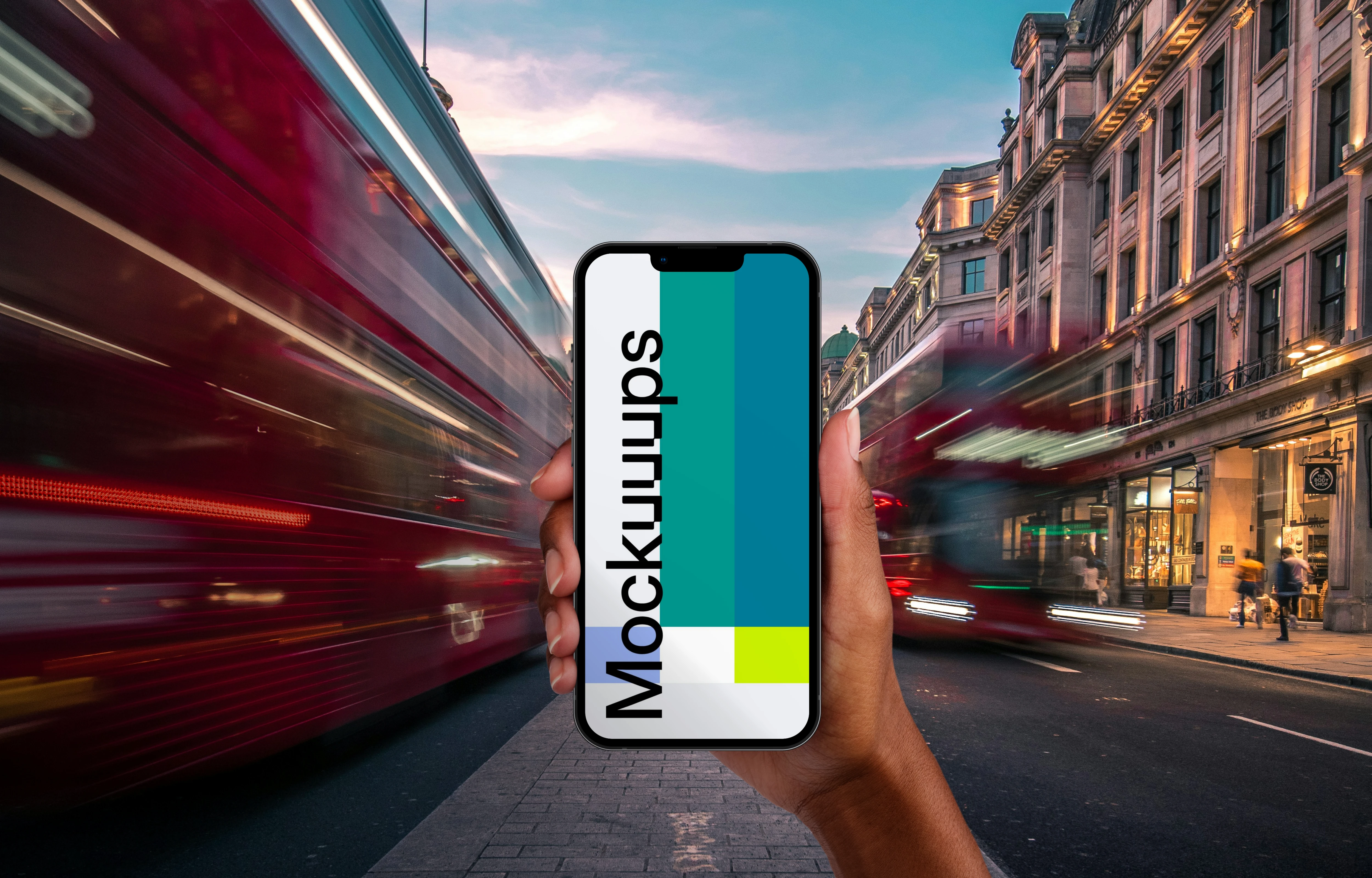 Holding smartphone mockup on the street