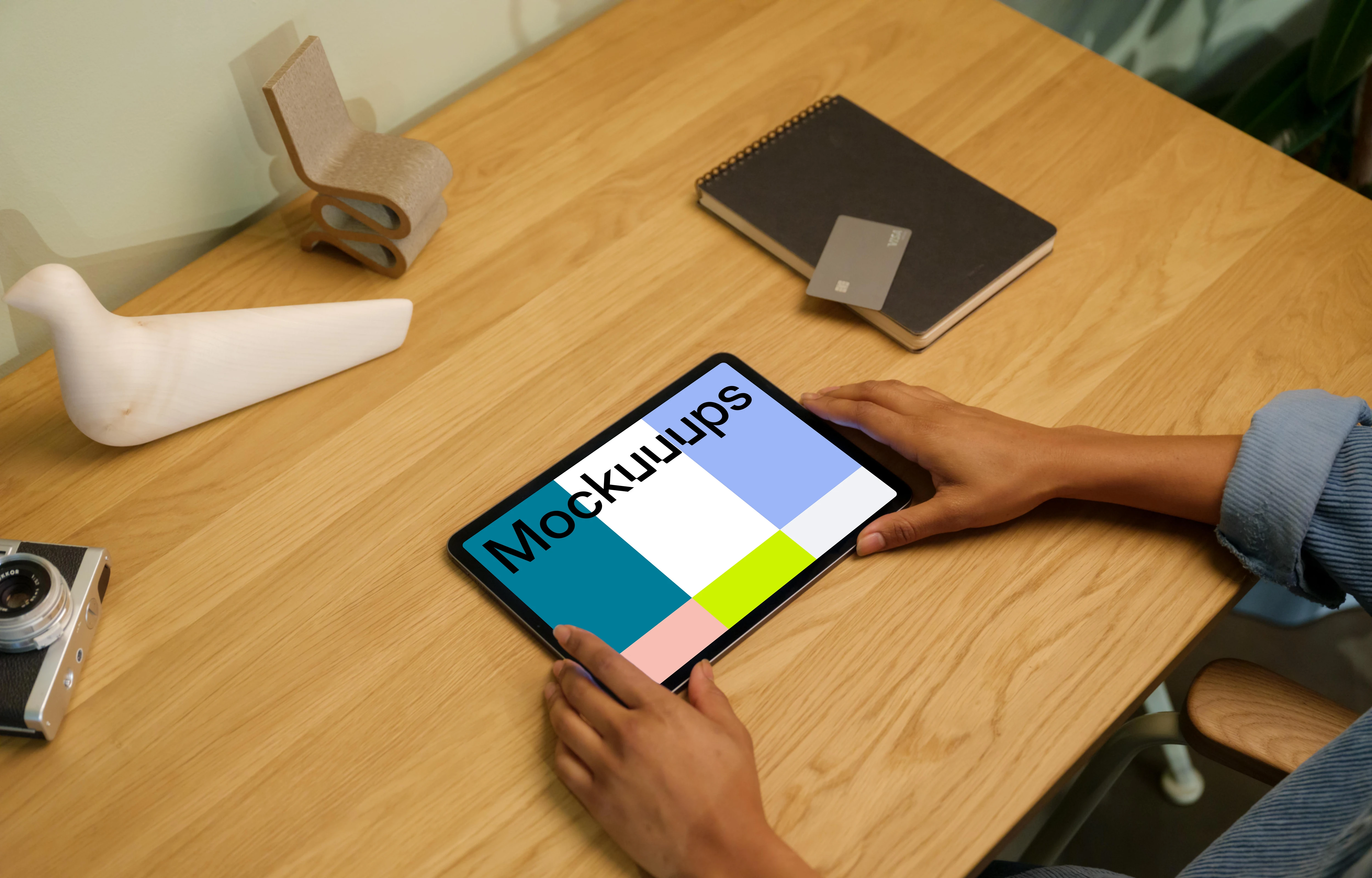 iPad Air mockup on wooden table with decorations