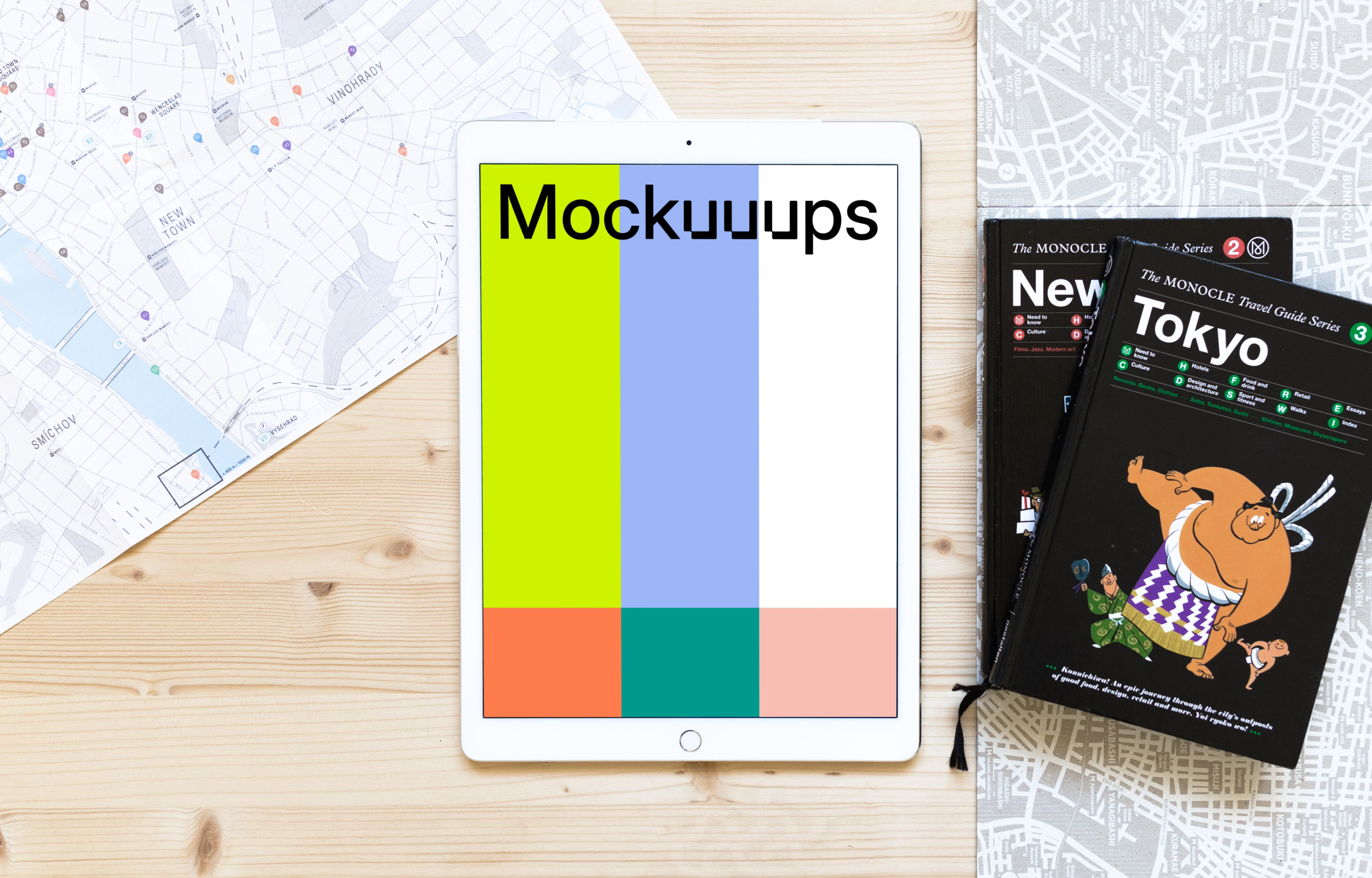 iPad Pro mockup next to the travel guides