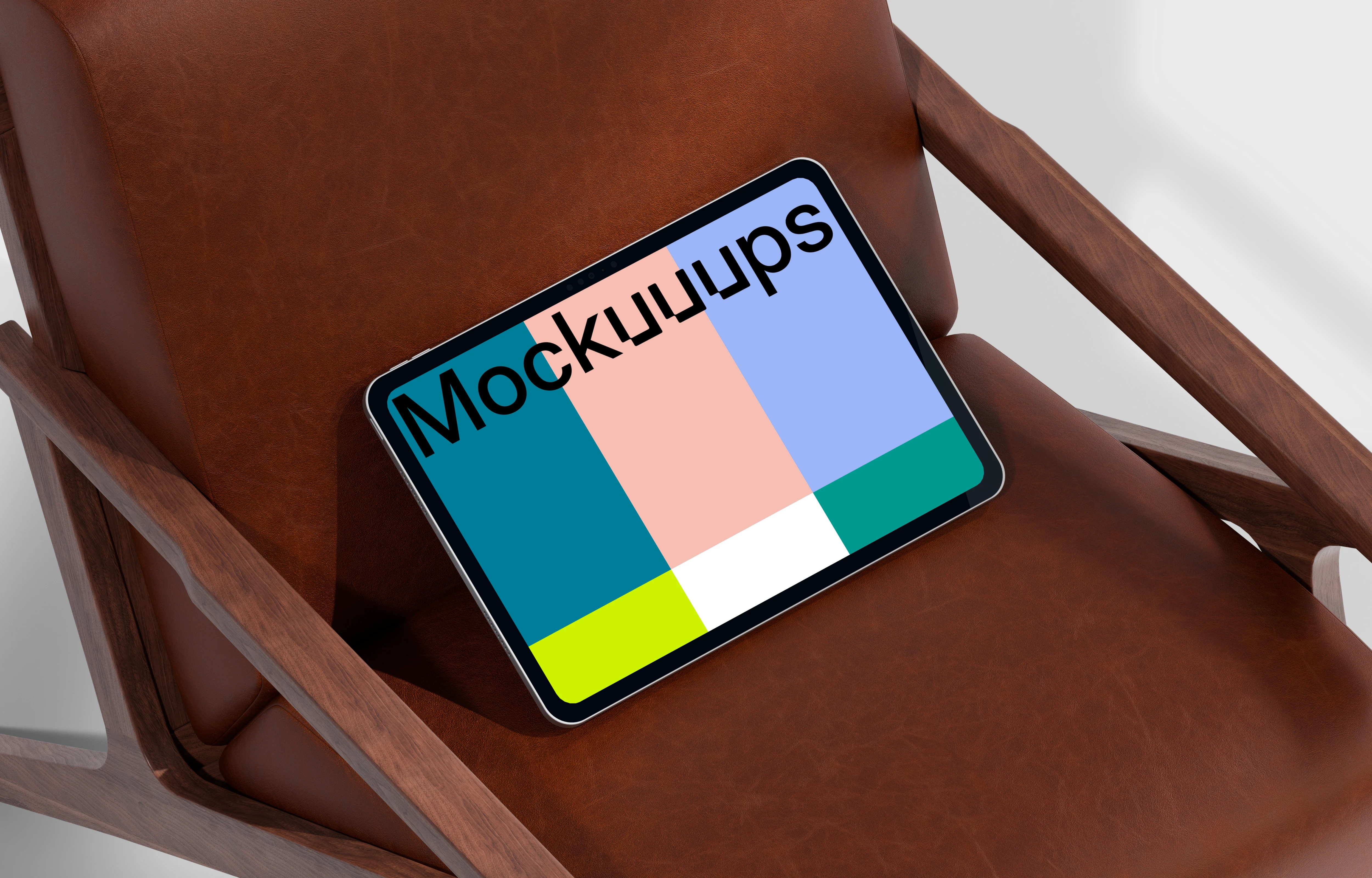 iPad Pro mockup on a leather chair