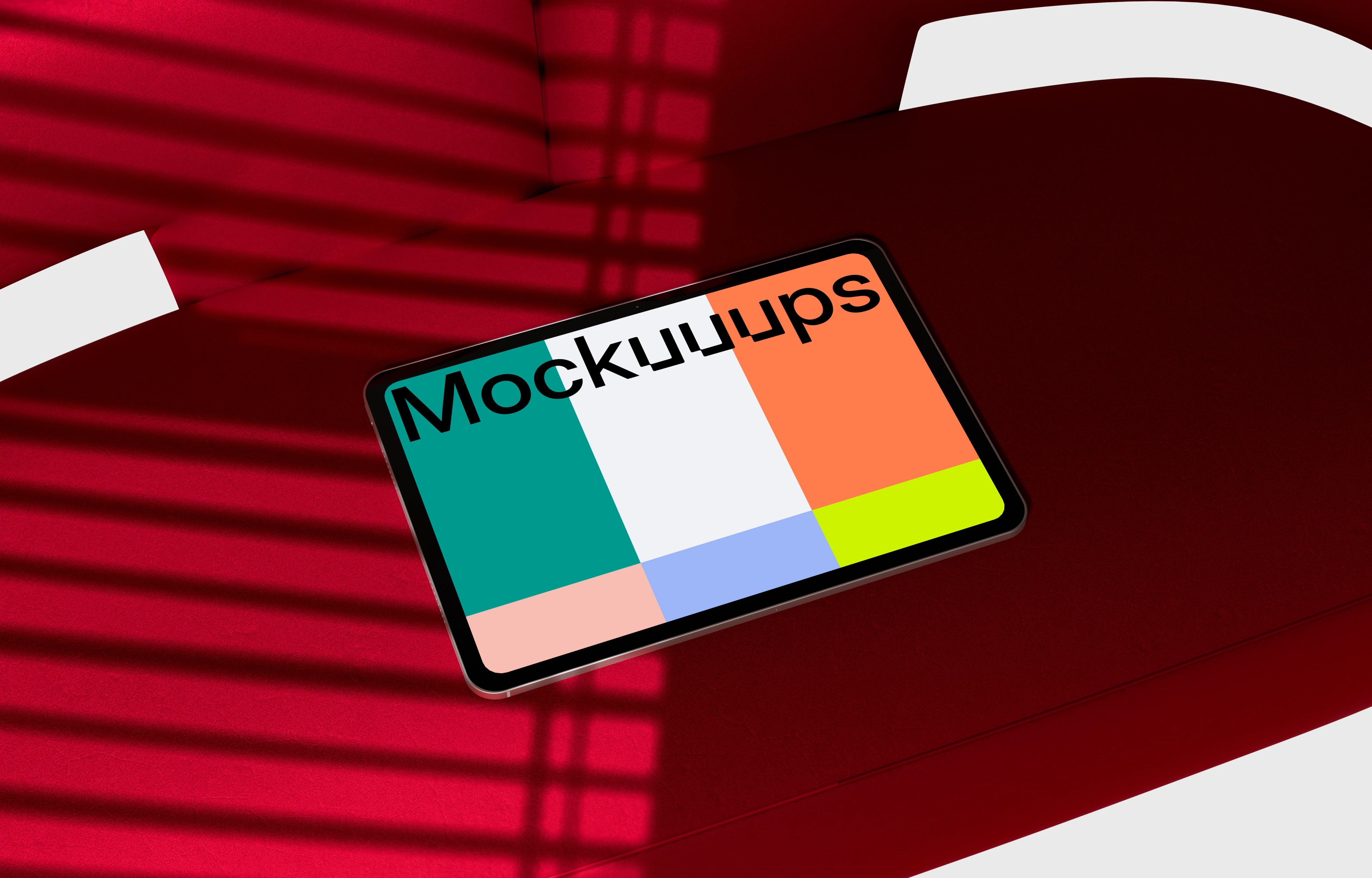 iPad Pro mockup on a red modern surface