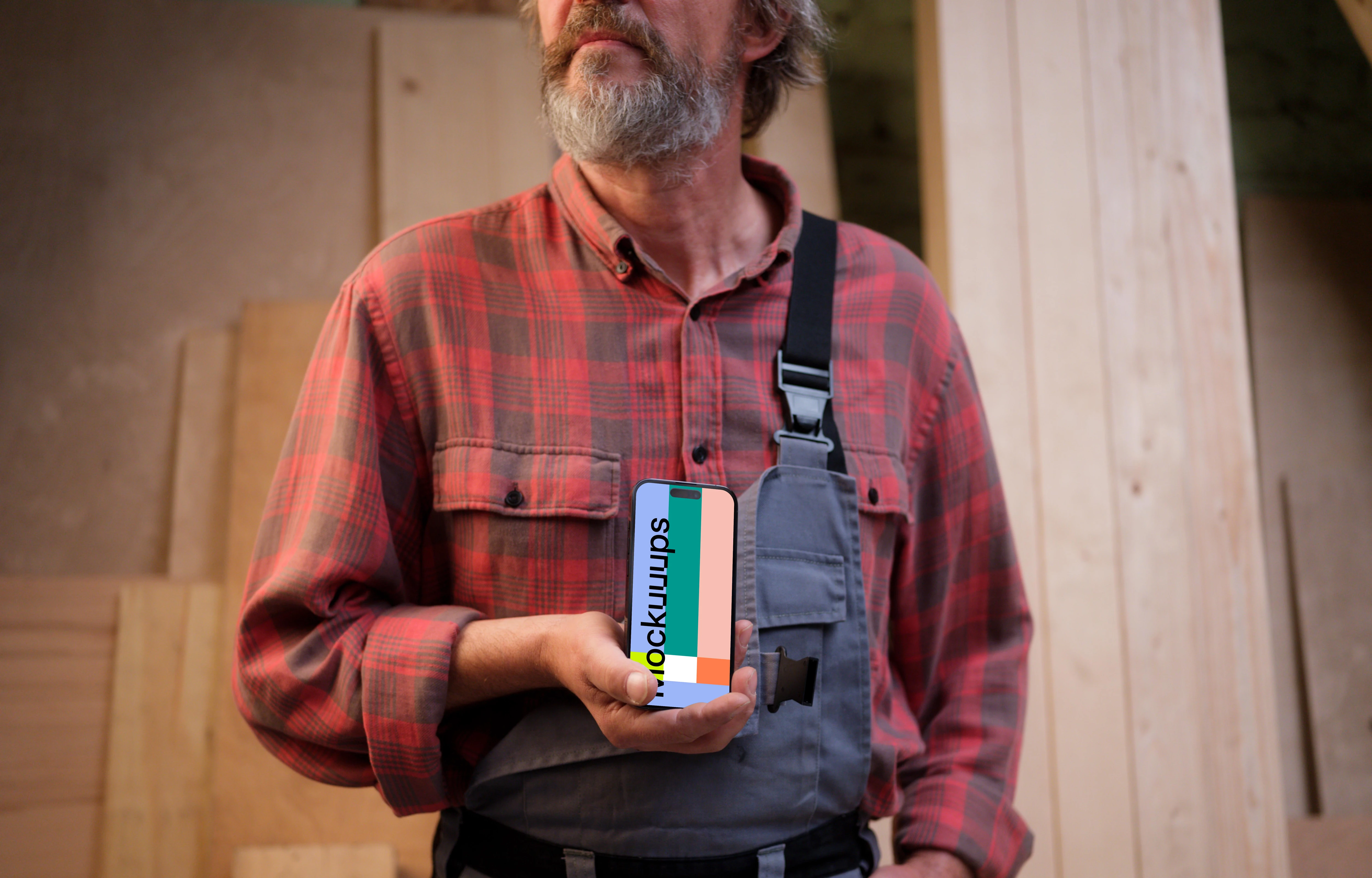 iPhone 14 Pro held by crafter