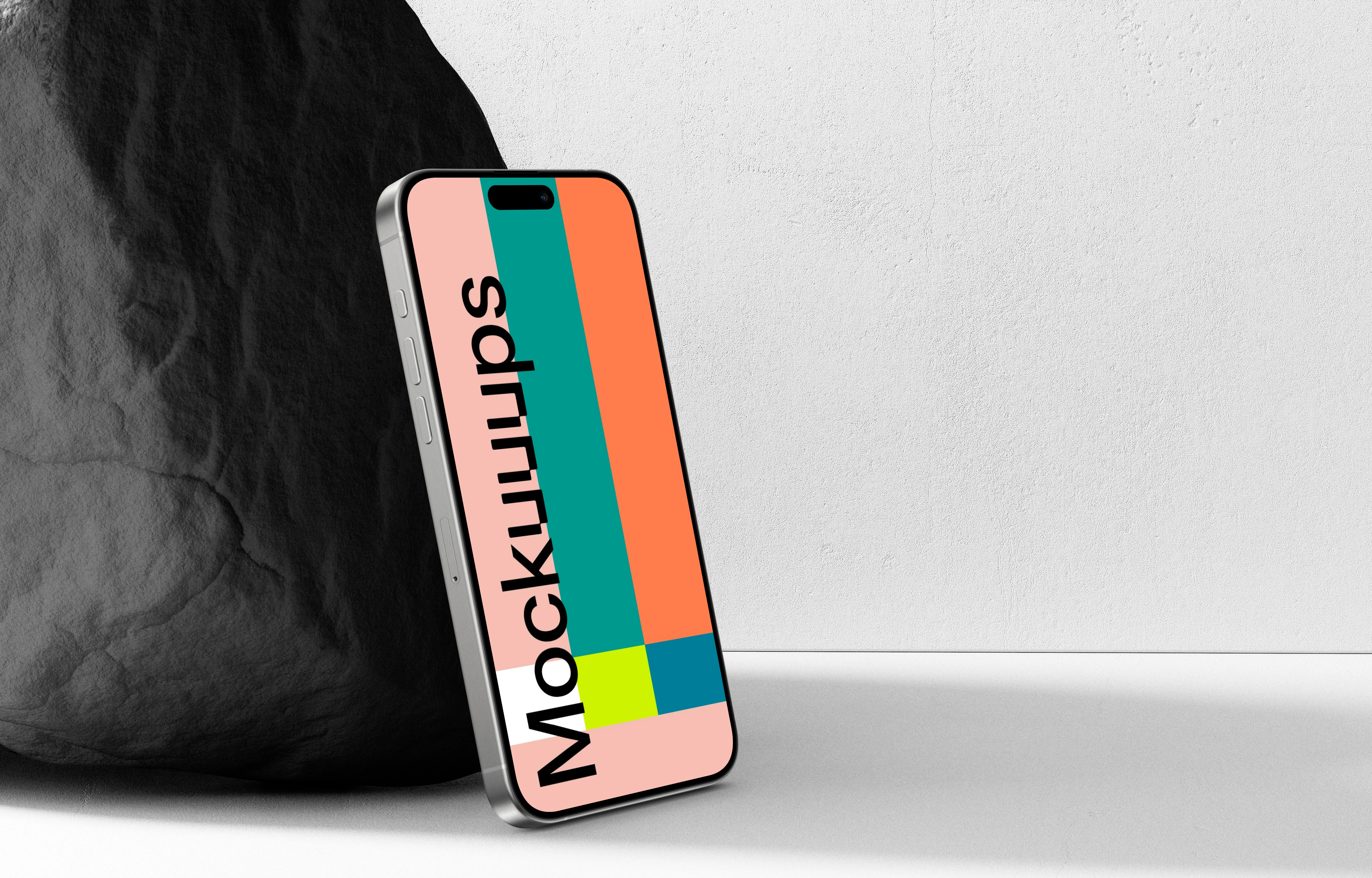 iPhone 15 Pro Leaning Against a Rock Mockup