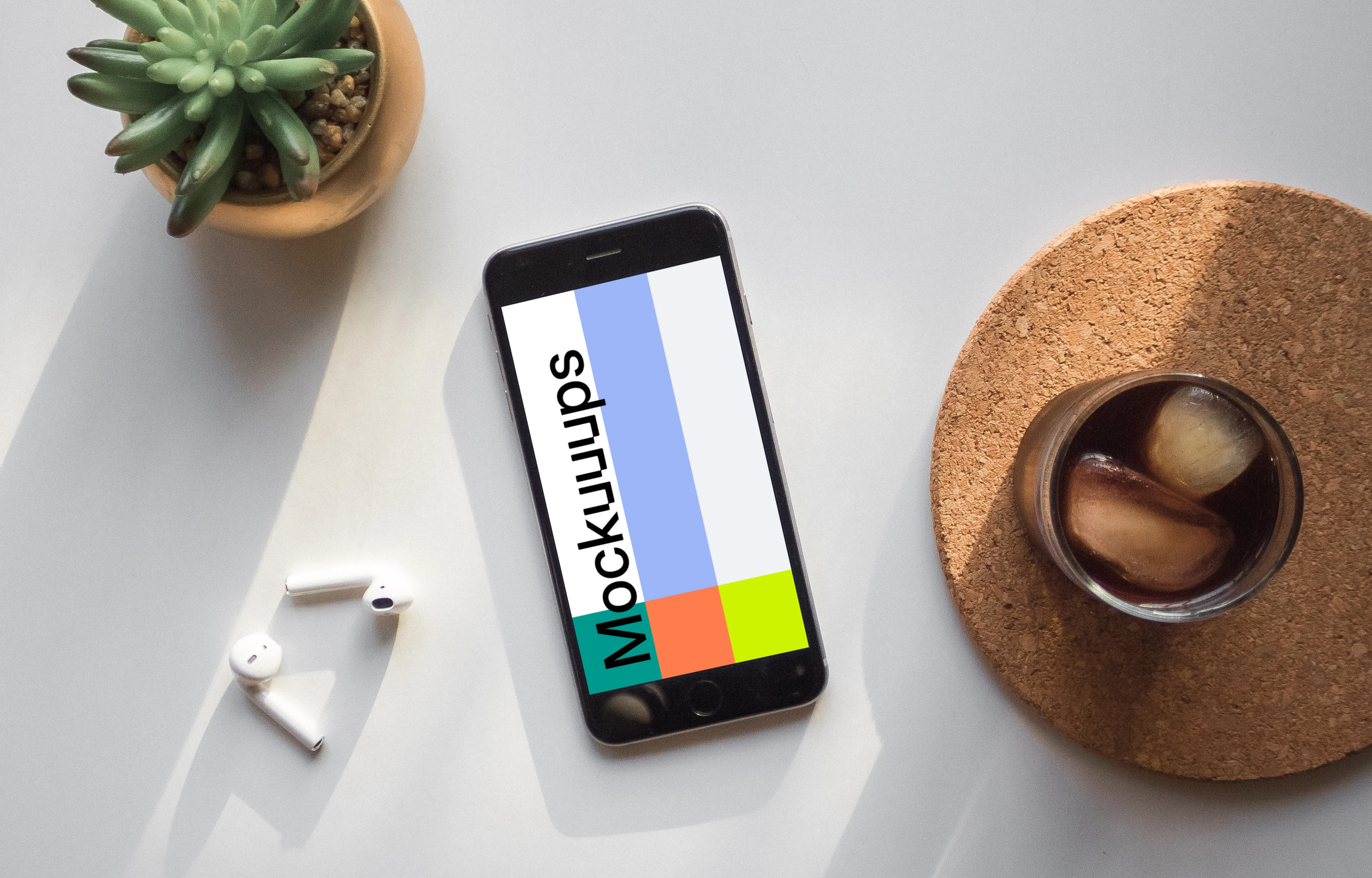 iPhone 6 Space Gray mockup on white table