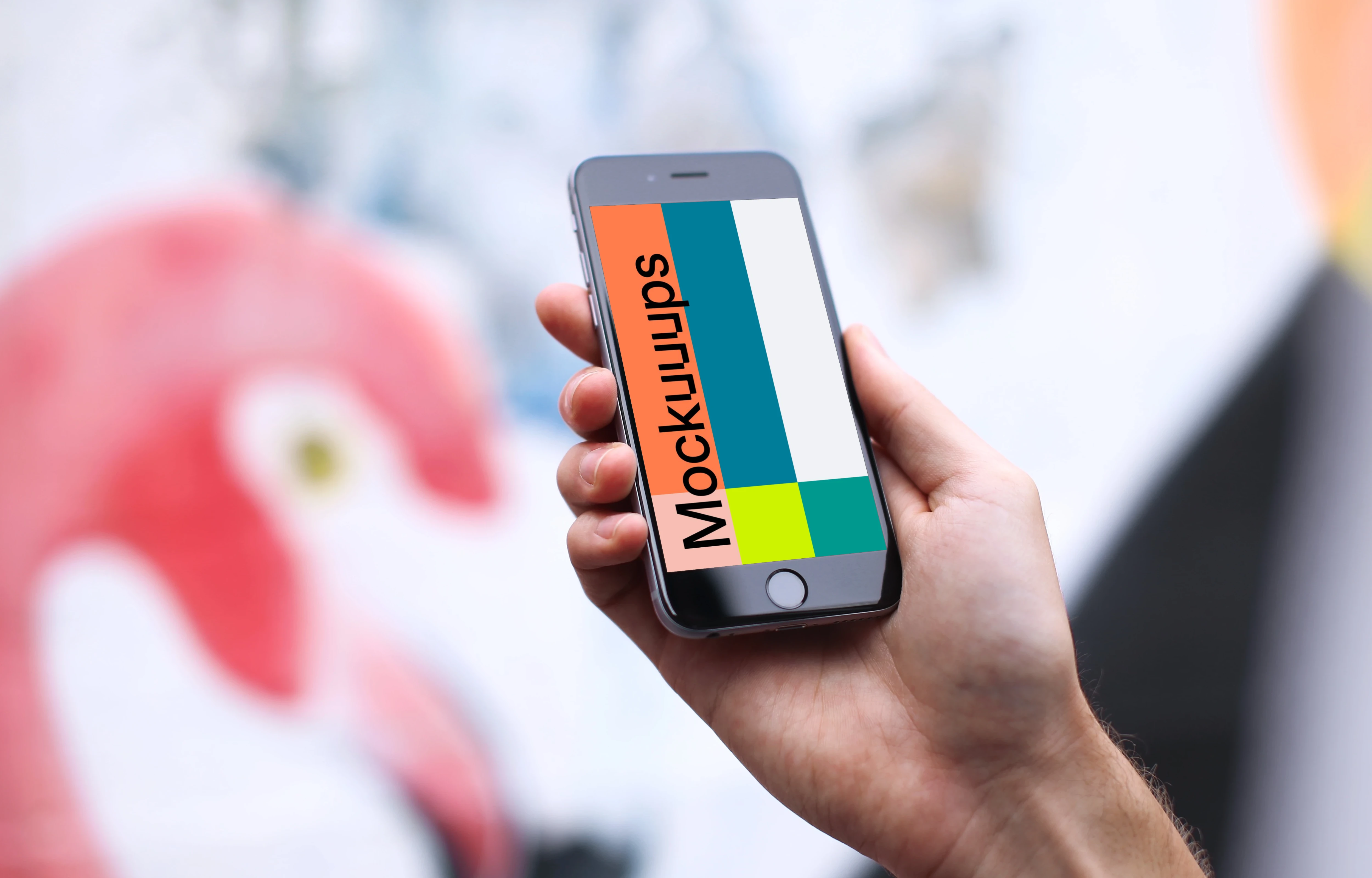 iPhone 6s mockup in front of the graffiti wall