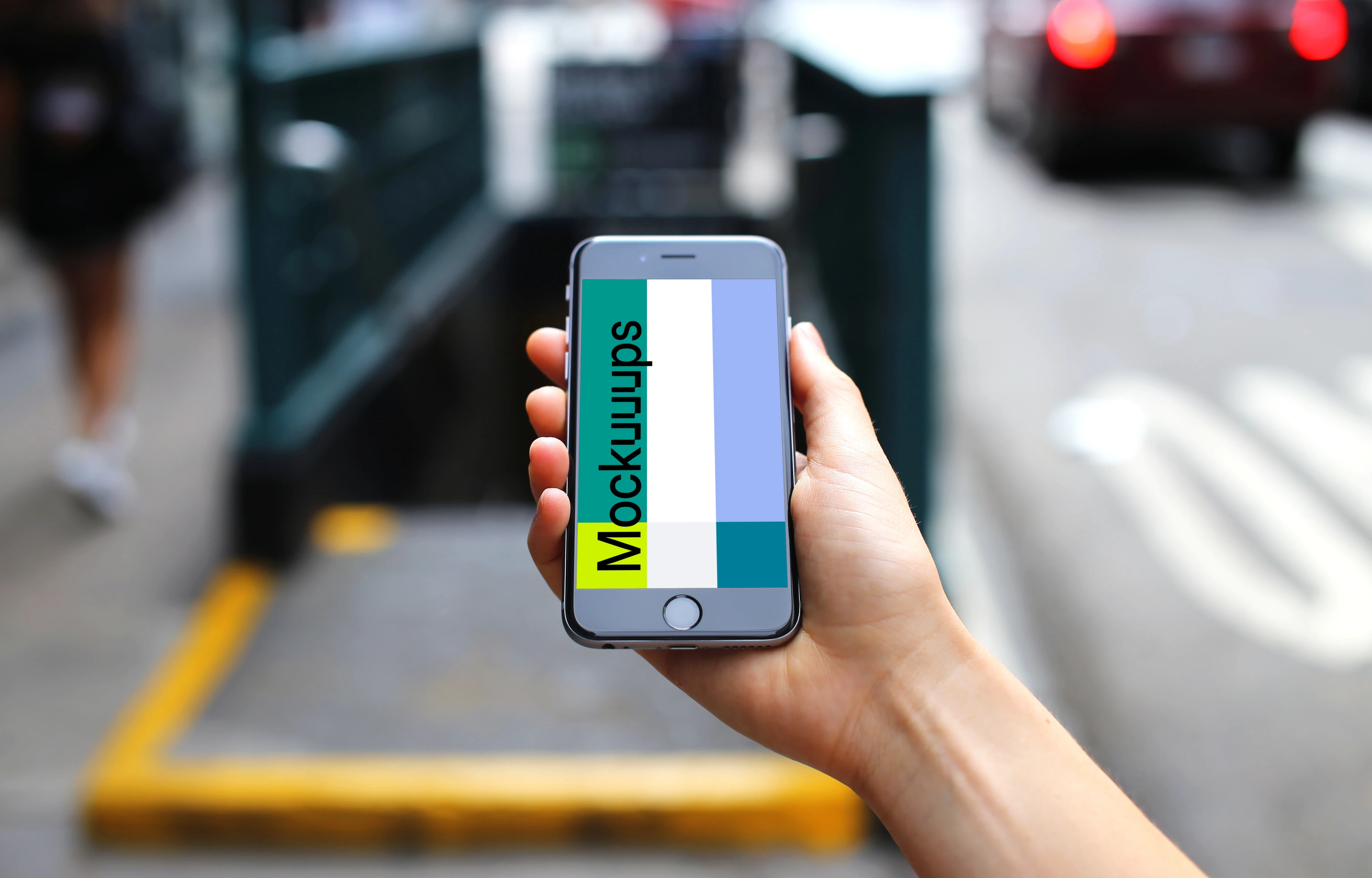 iPhone 6s mockup in front of Underground Entrance