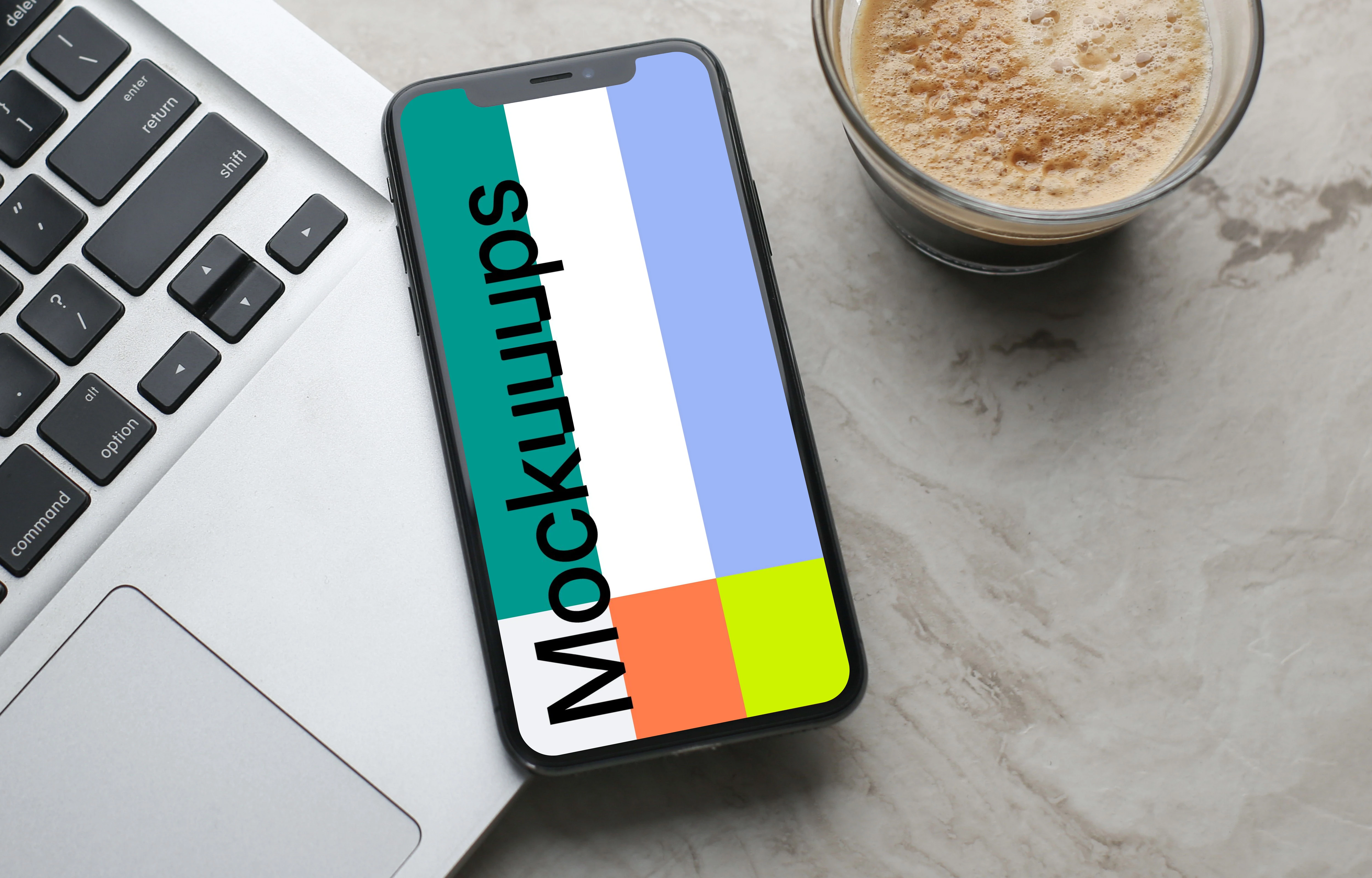 iPhone mockup placed on a MacBook