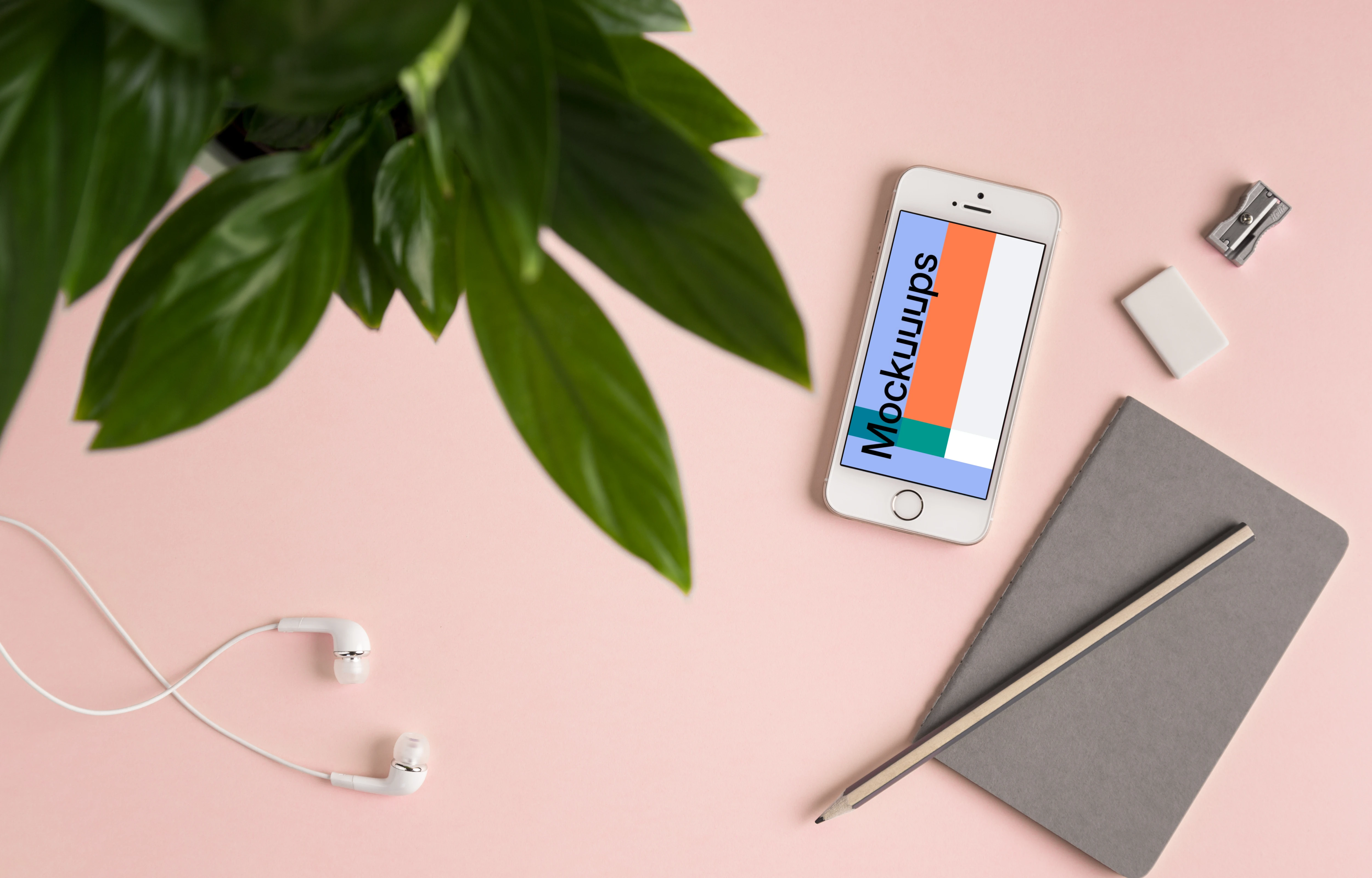 iPhone SE mockup on pink background