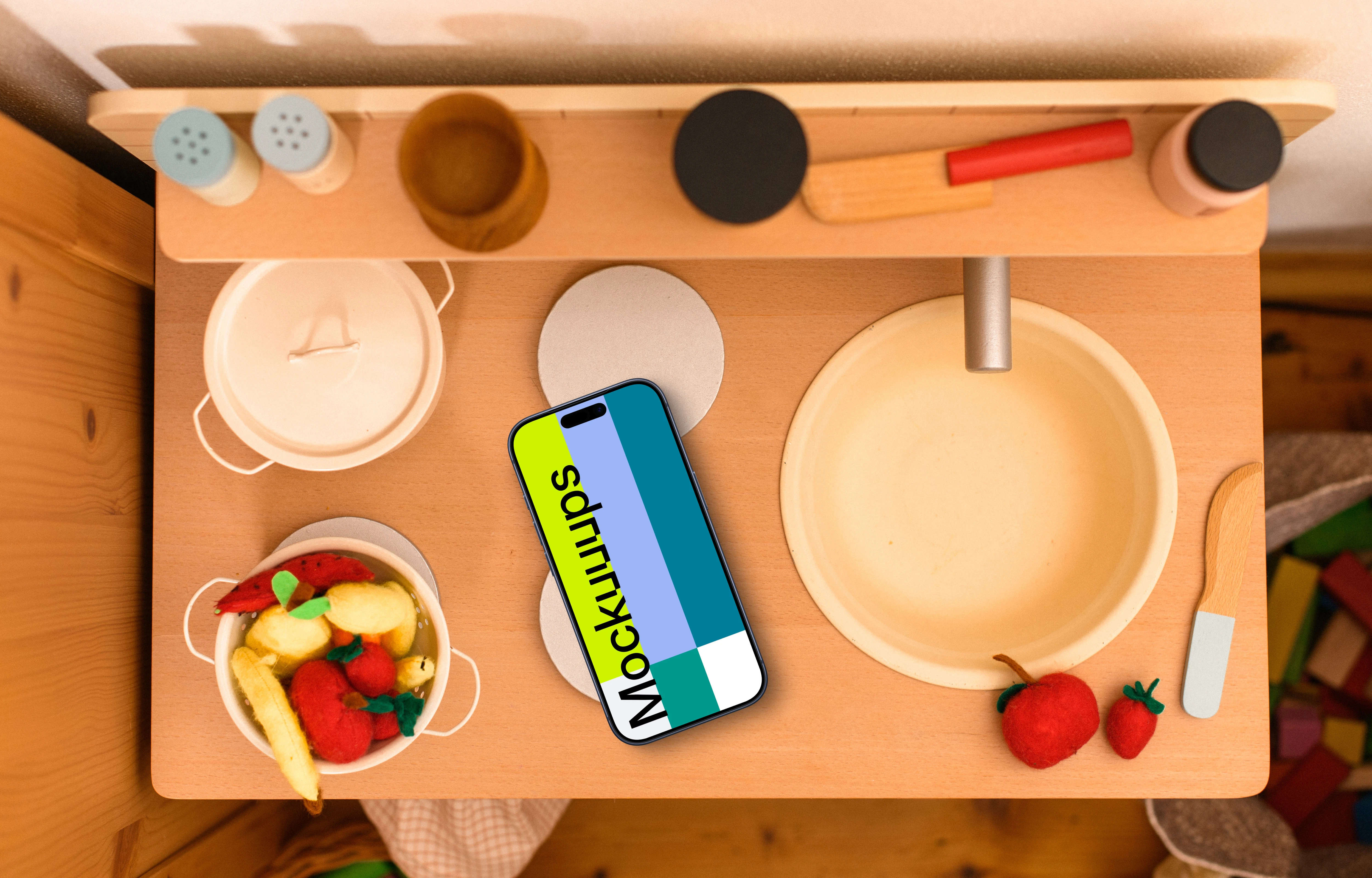 Smartphone mockup on a colorful play kitchen