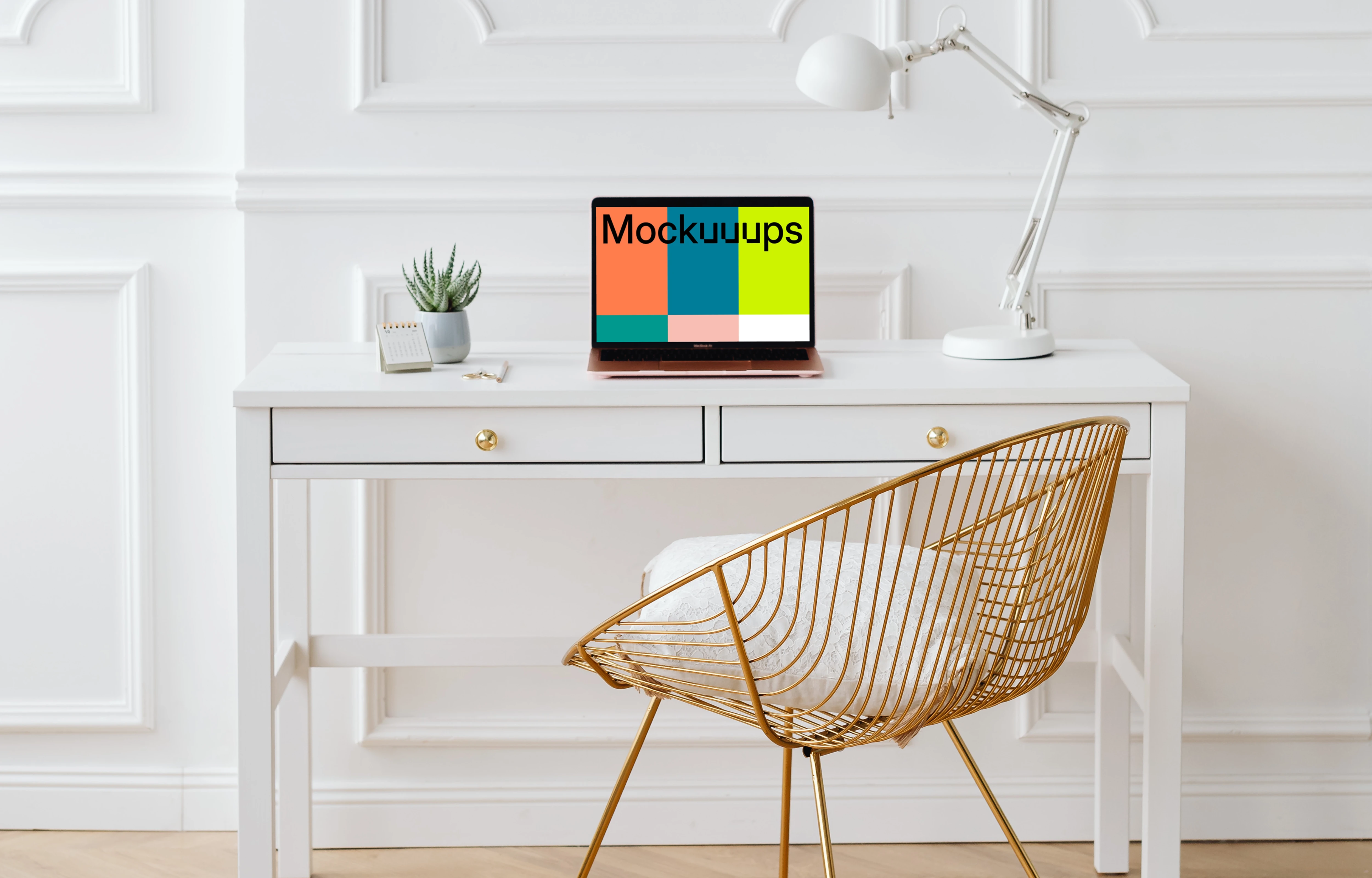 MacBook Air mockup on a table beside a reading lamp