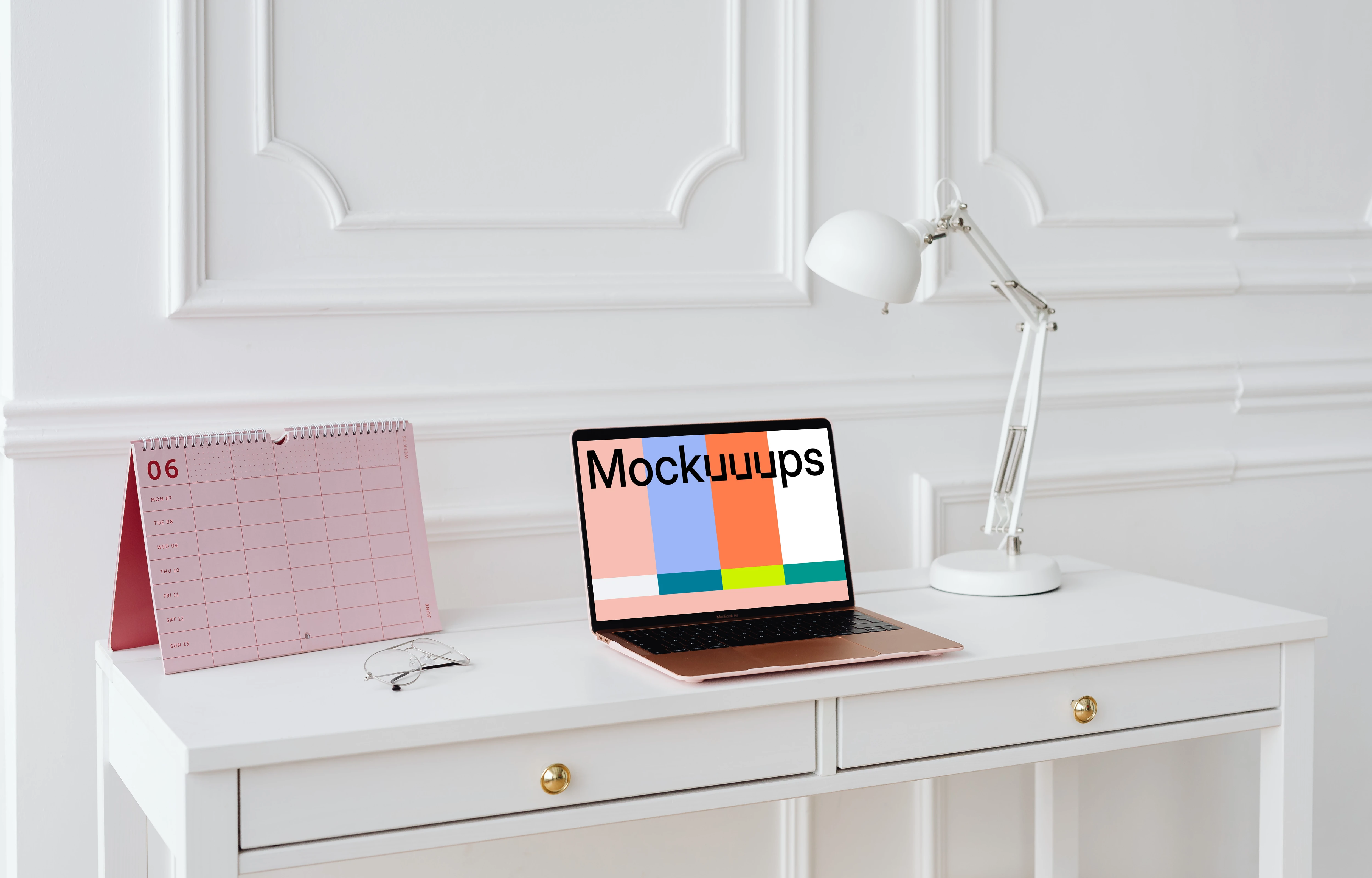 MacBook Air mockup with a pink calendar at the side