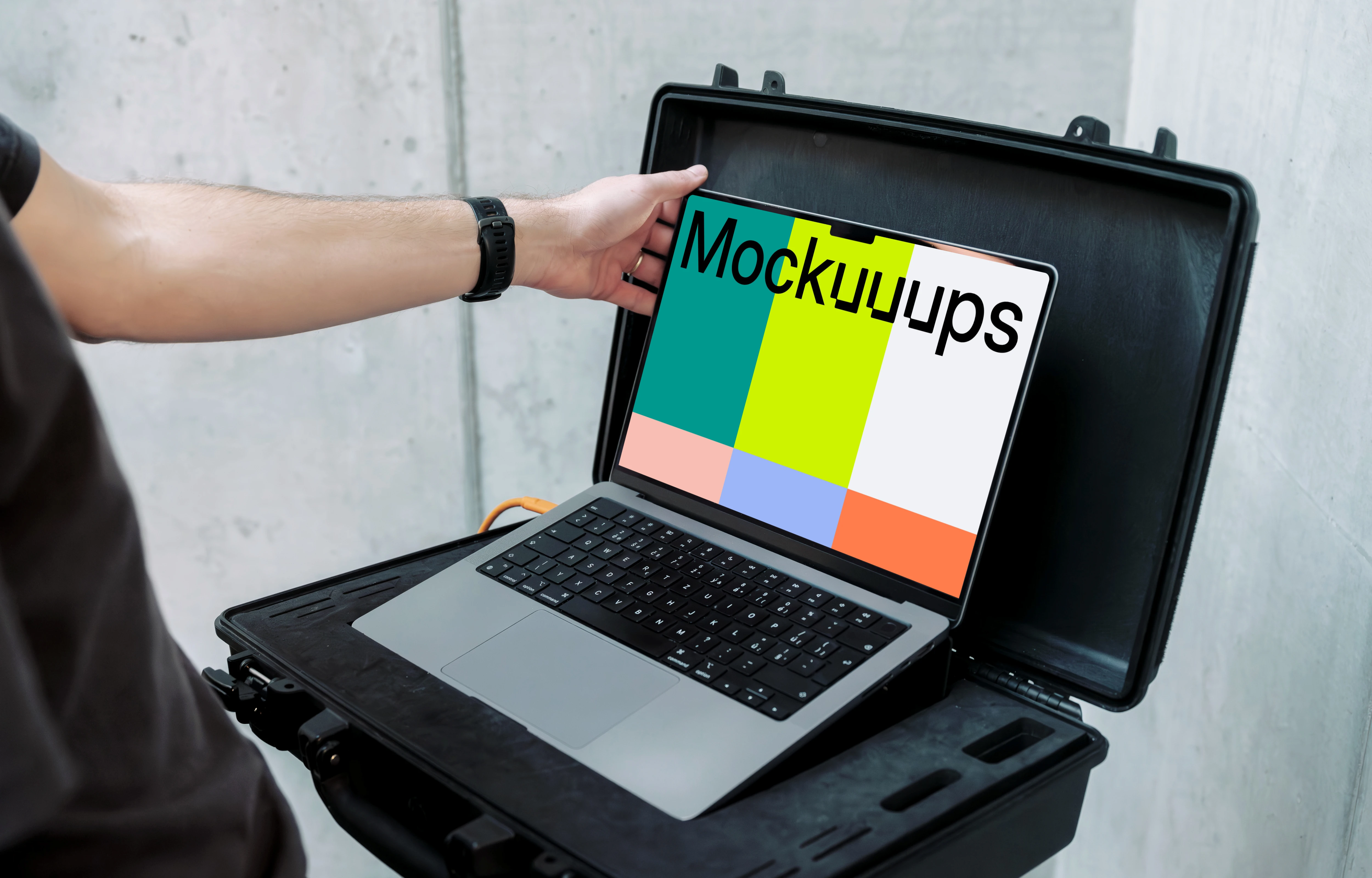 MacBook Pro 14 Mockup with Man Setting Up Display