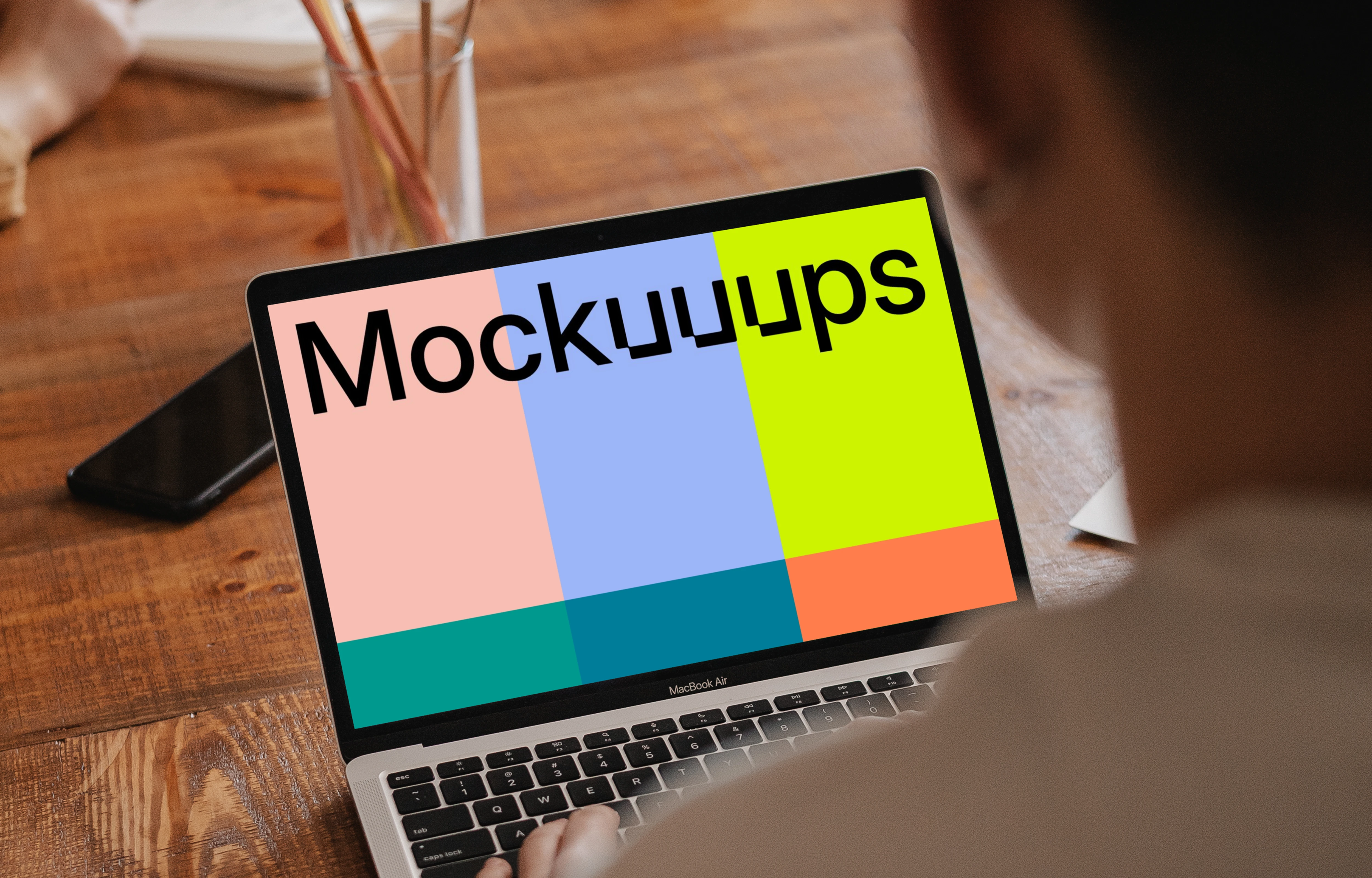 MacBook Pro mockup in a meeting room