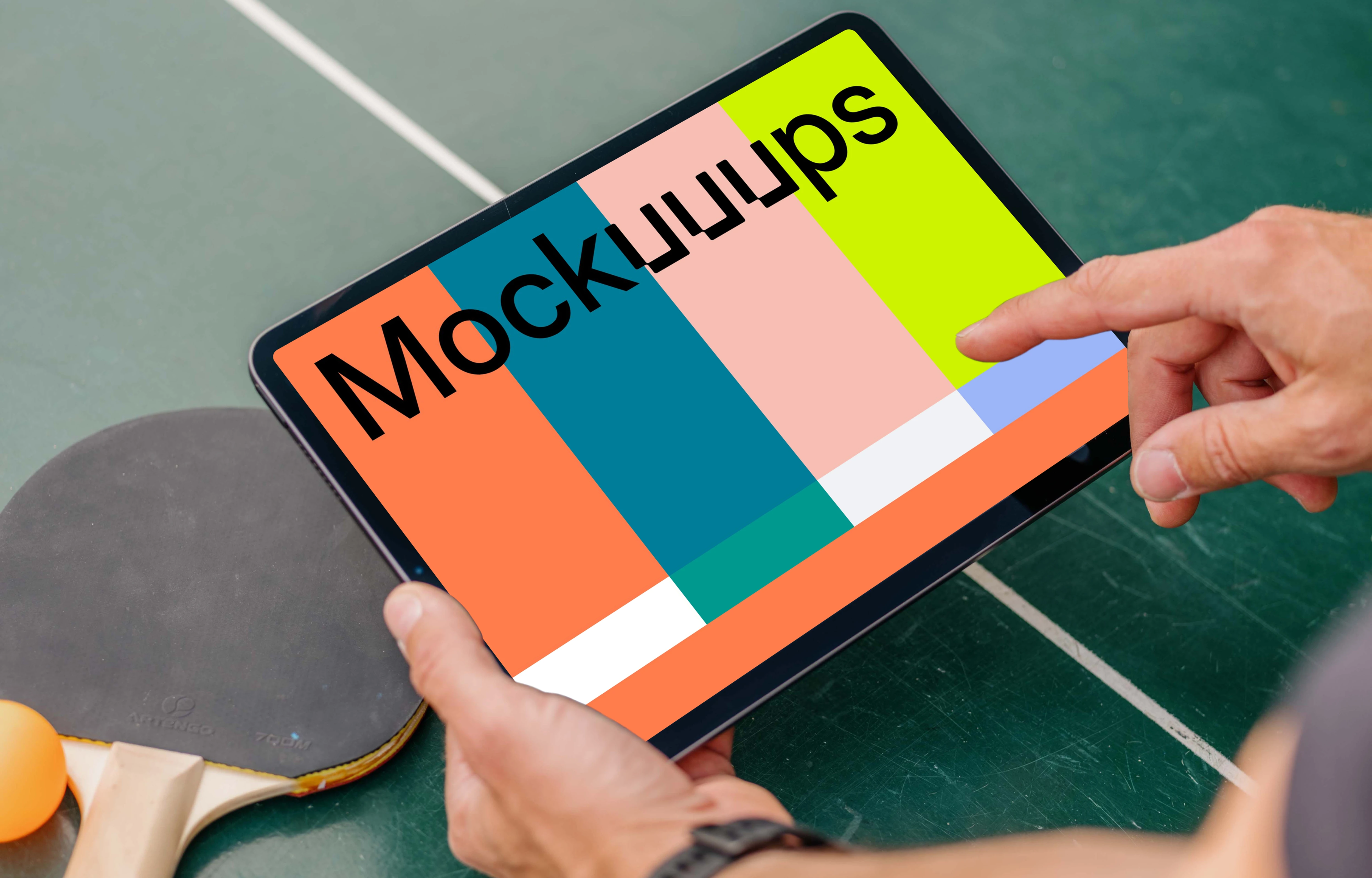 Man pointing on an iPad mockup