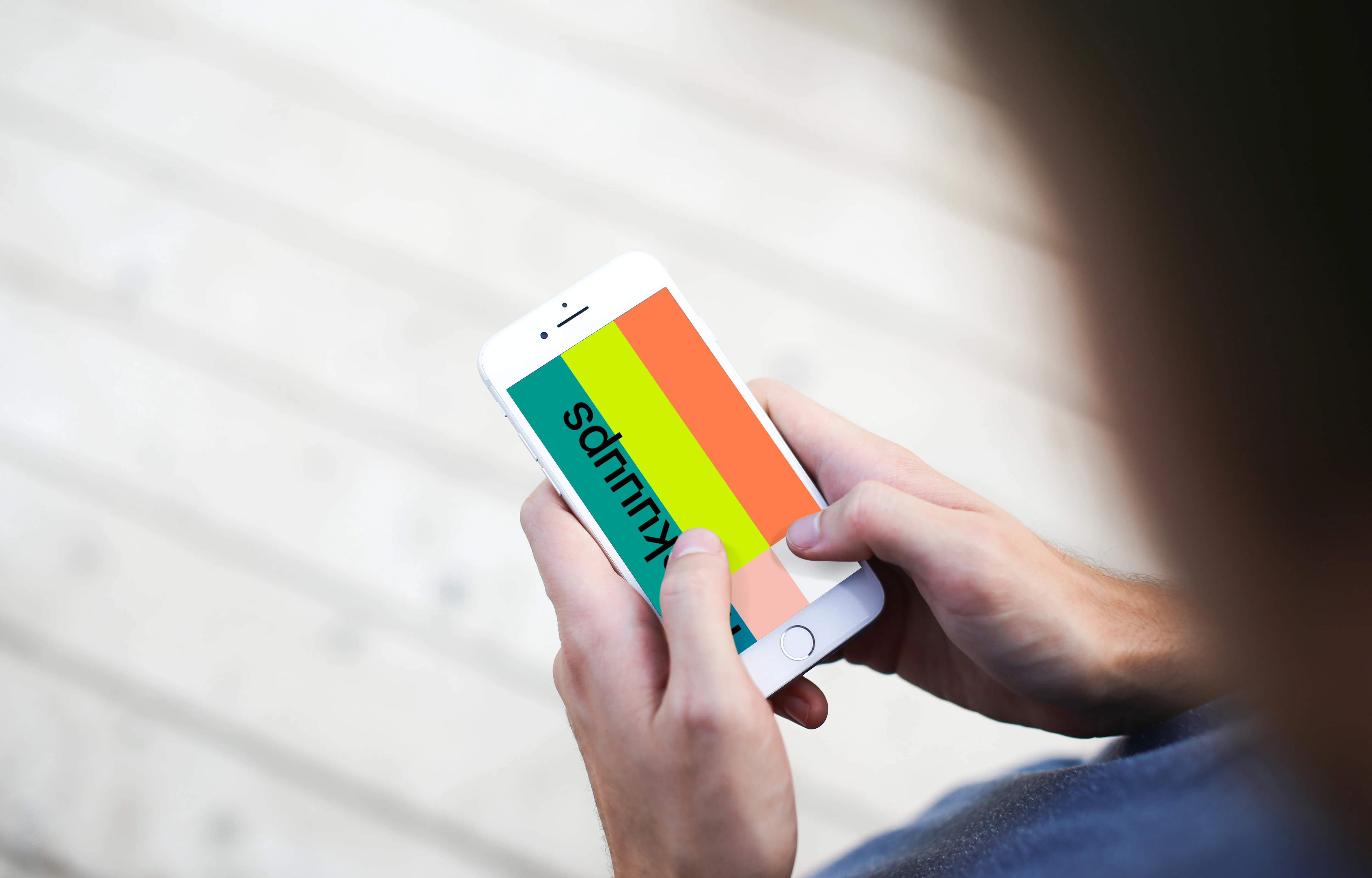 Man typing on iPhone 7 mockup