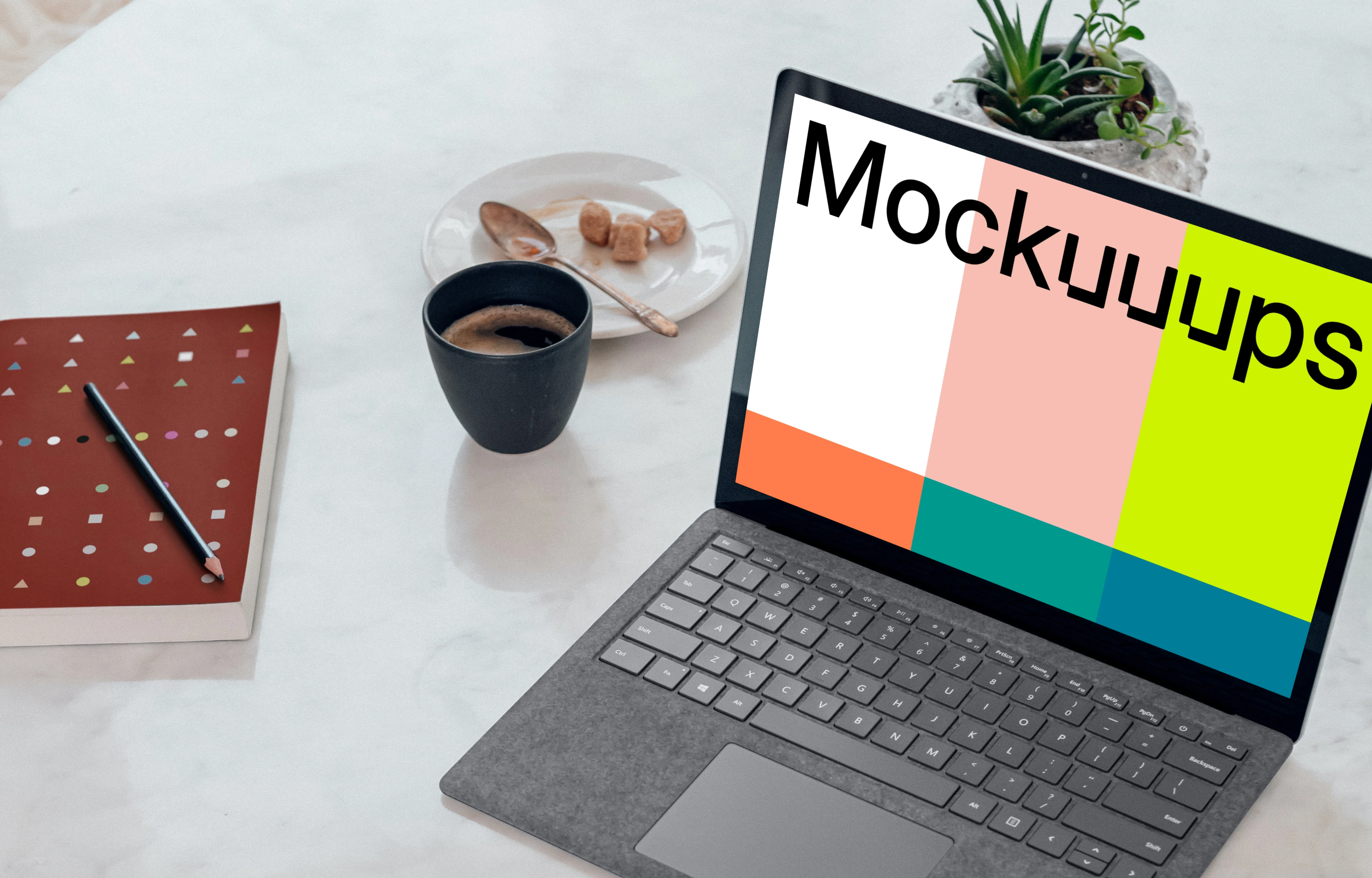 Microsoft Surface Laptop mockup on the marble table